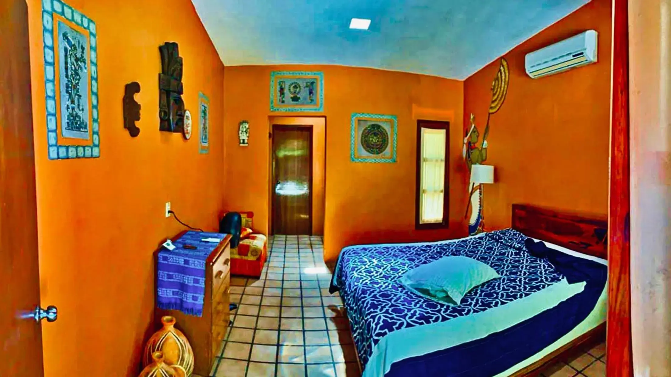 Photo of the whole room in Gardenhotel Macan Ché B&B