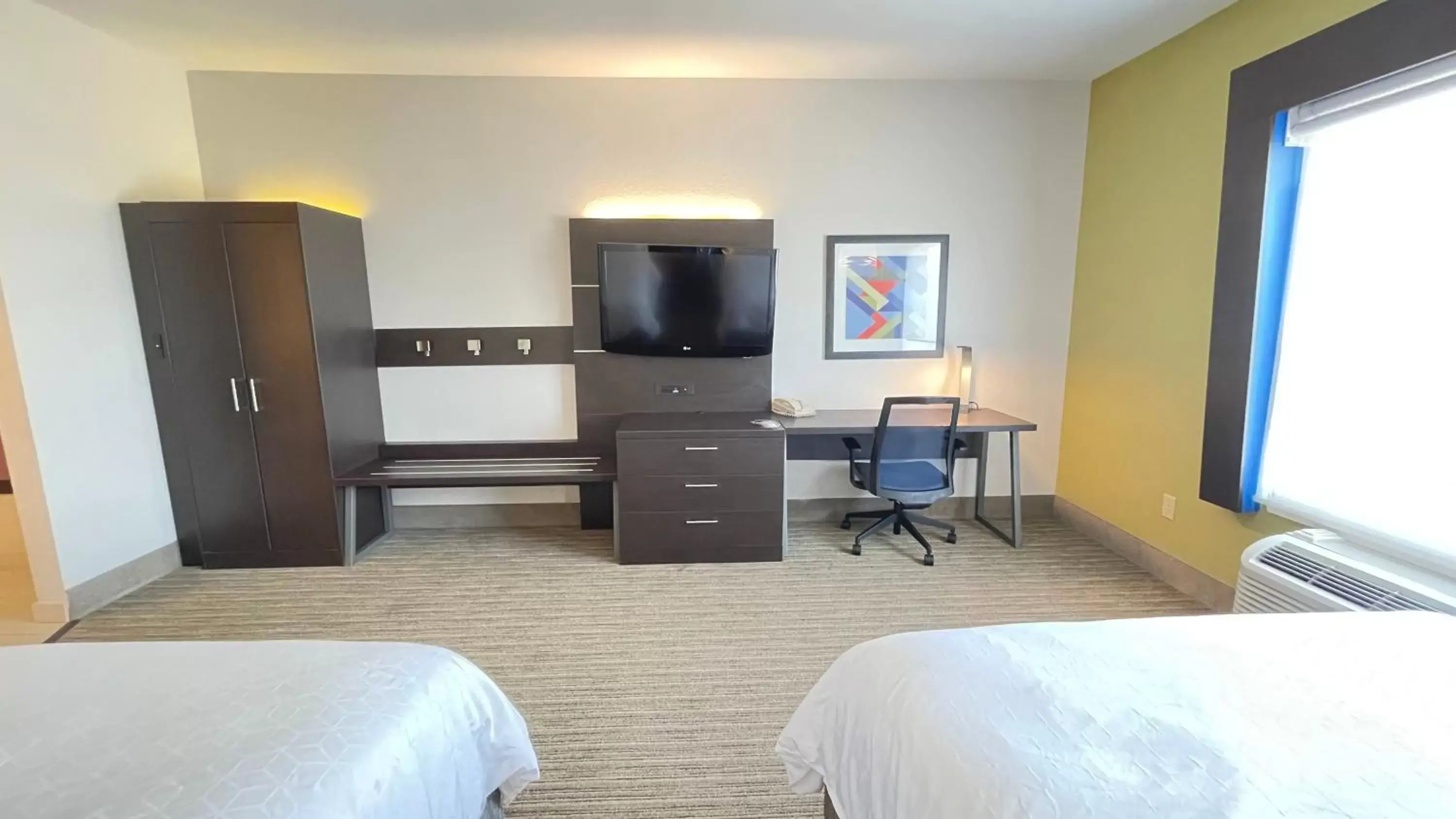 Photo of the whole room, TV/Entertainment Center in Holiday Inn Express Hotel & Suites Decatur, TX, an IHG Hotel