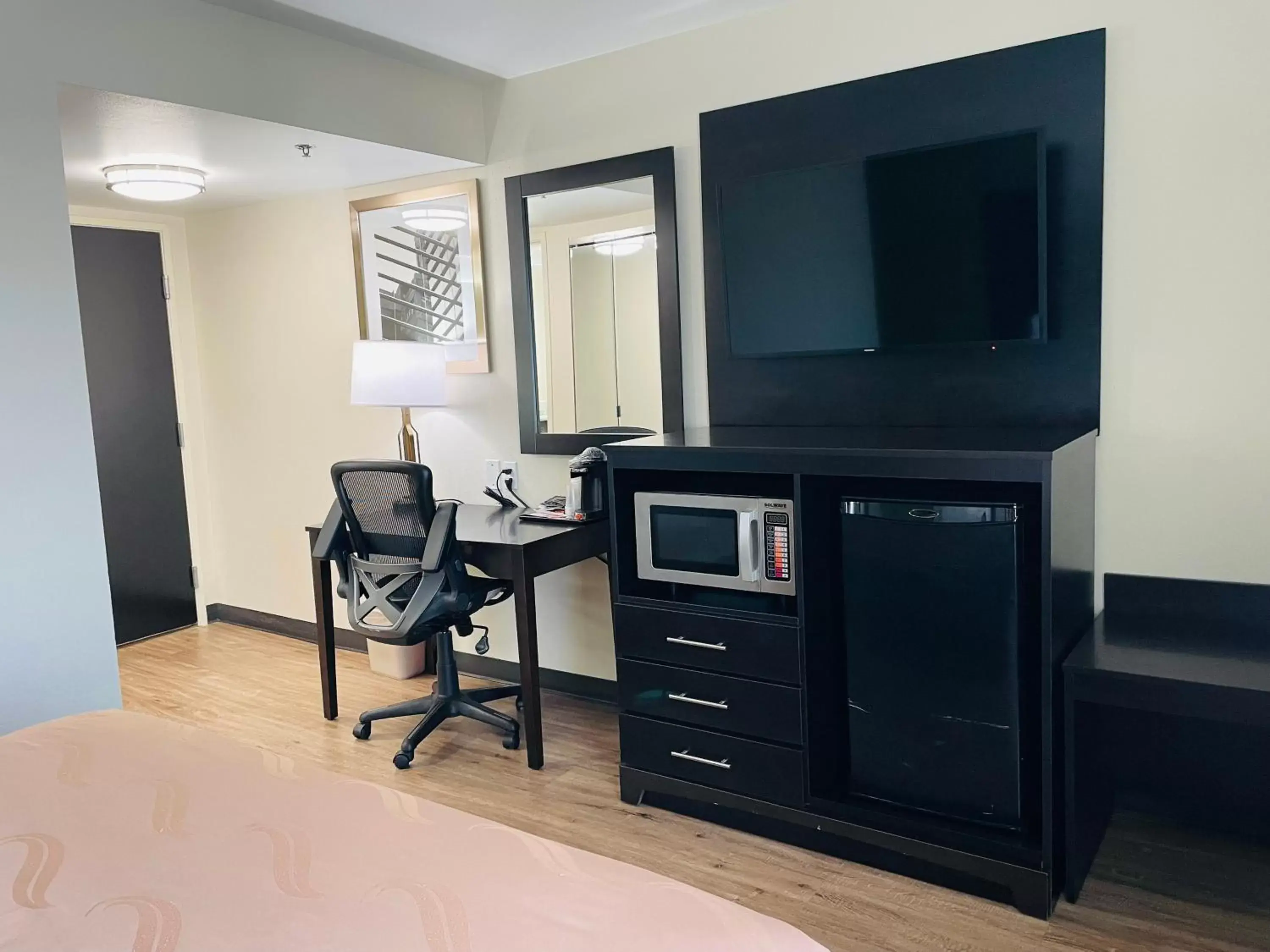 Photo of the whole room, TV/Entertainment Center in Quality Inn & Suites Lake Charles