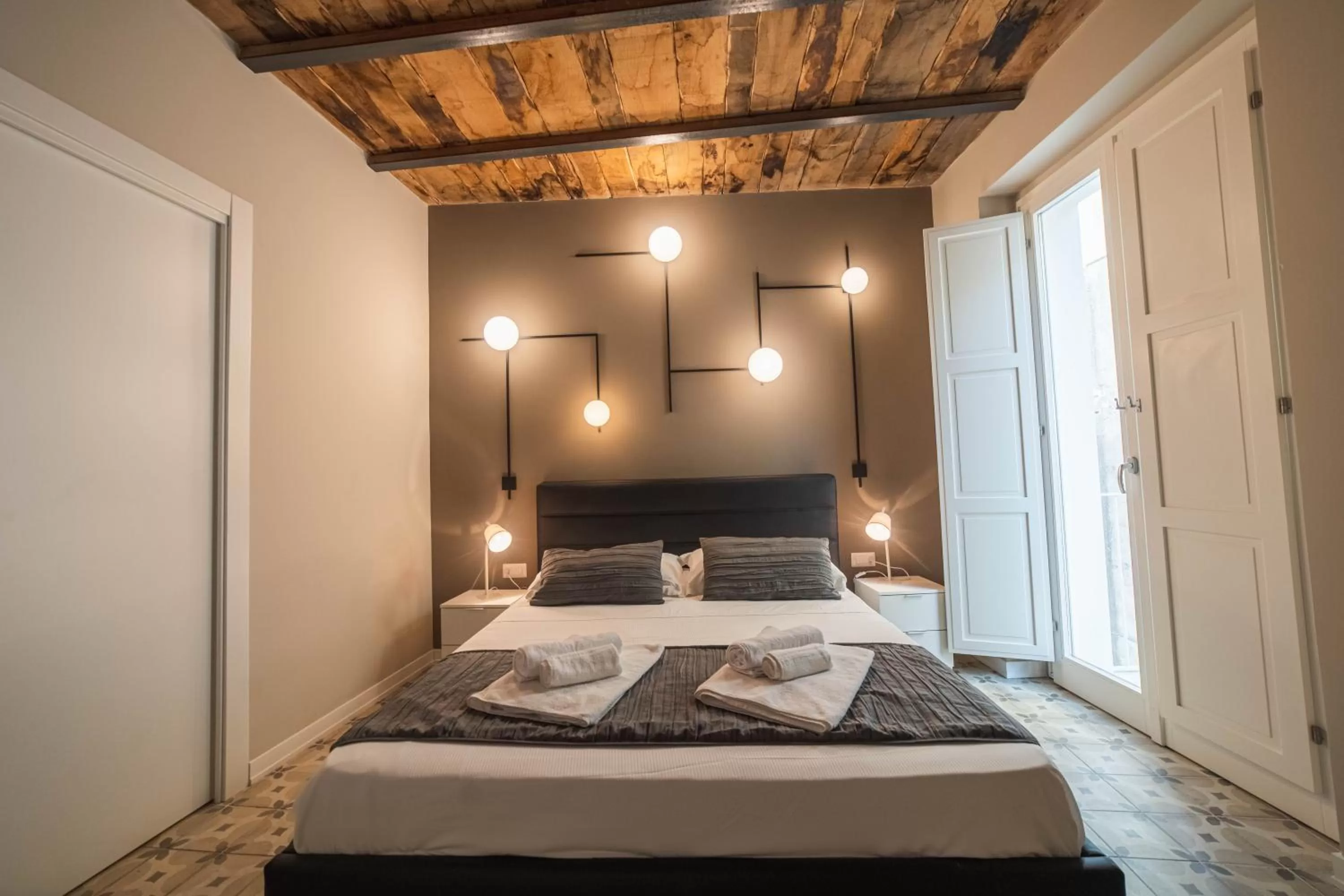 Bed in Palazzo Paladini - Luxury Suites in the Heart of the Old Town