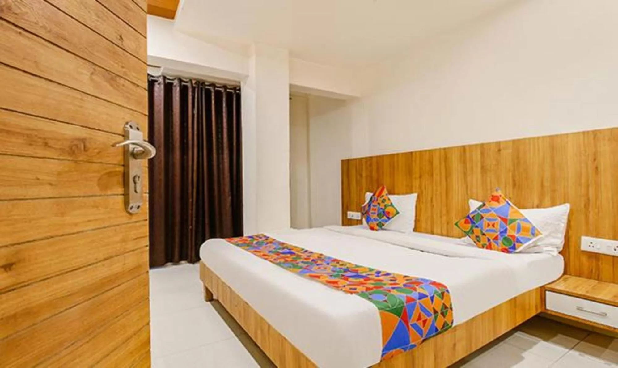 Photo of the whole room, Bed in FabExpress Sunshine Regency