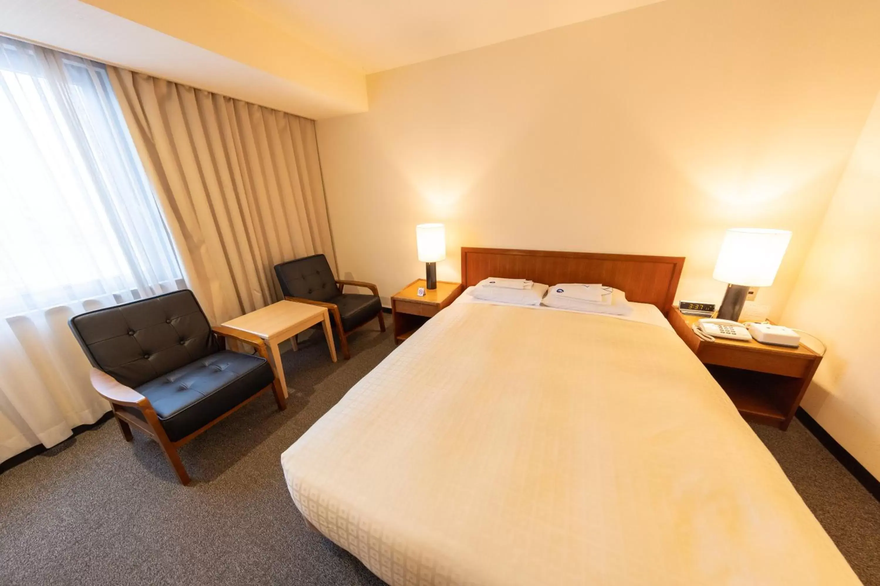 Bed in Nagaoka Grand Hotel