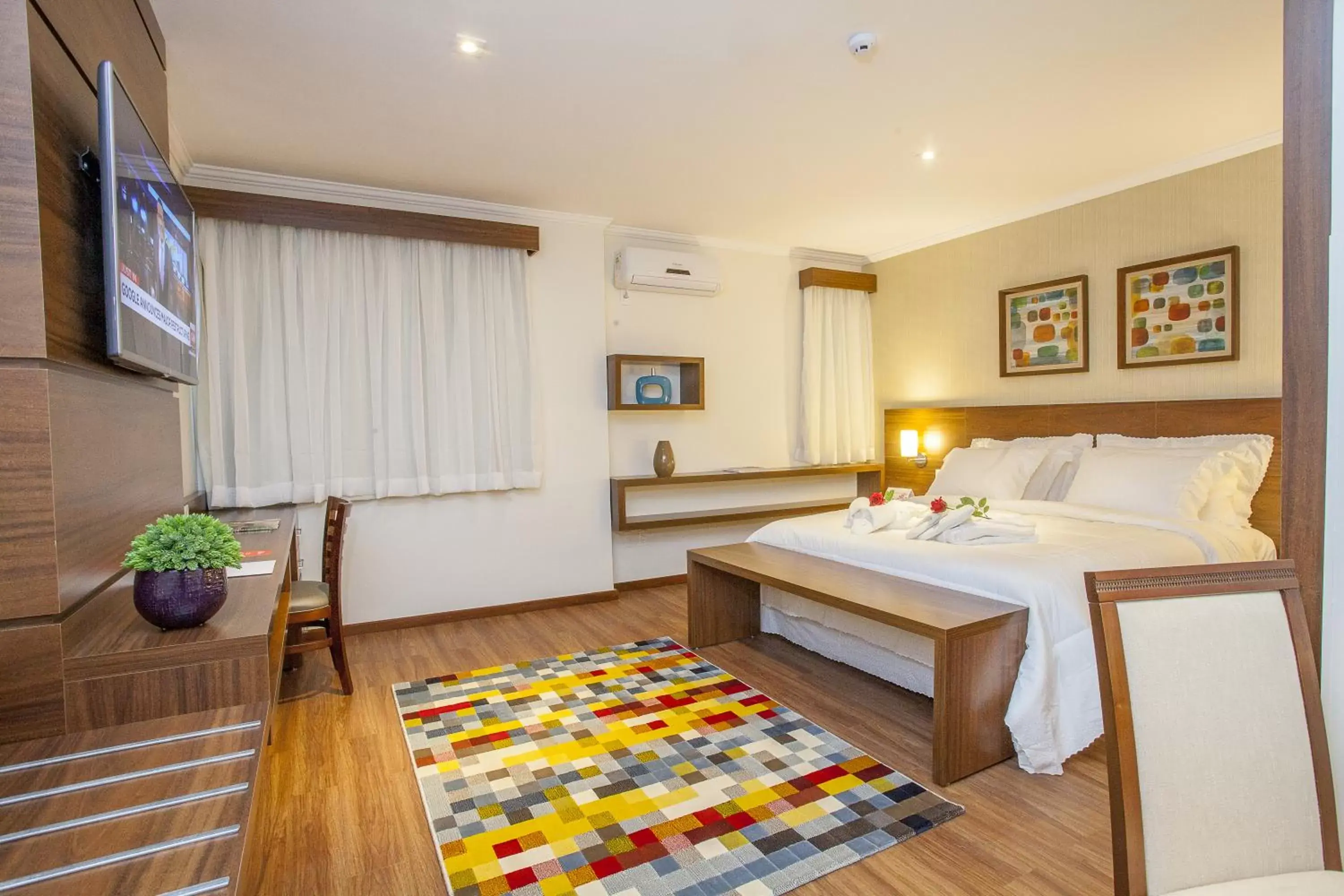 Photo of the whole room, Bed in São Carlos Marklin Suítes Photo of the whole room, Bed in São Carlos Marklin Suítes