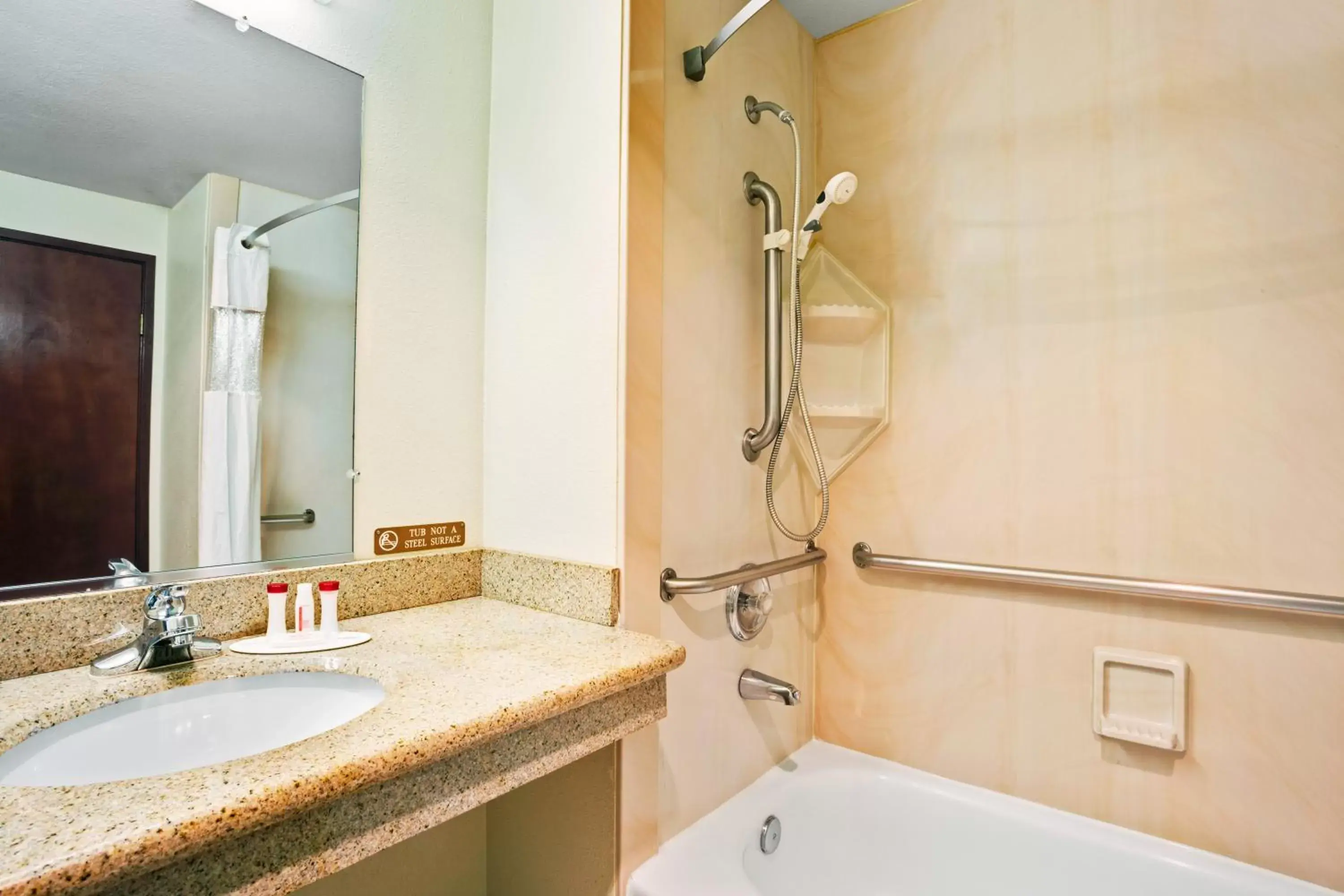 Bathroom in Ramada by Wyndham Tukwila Southcenter