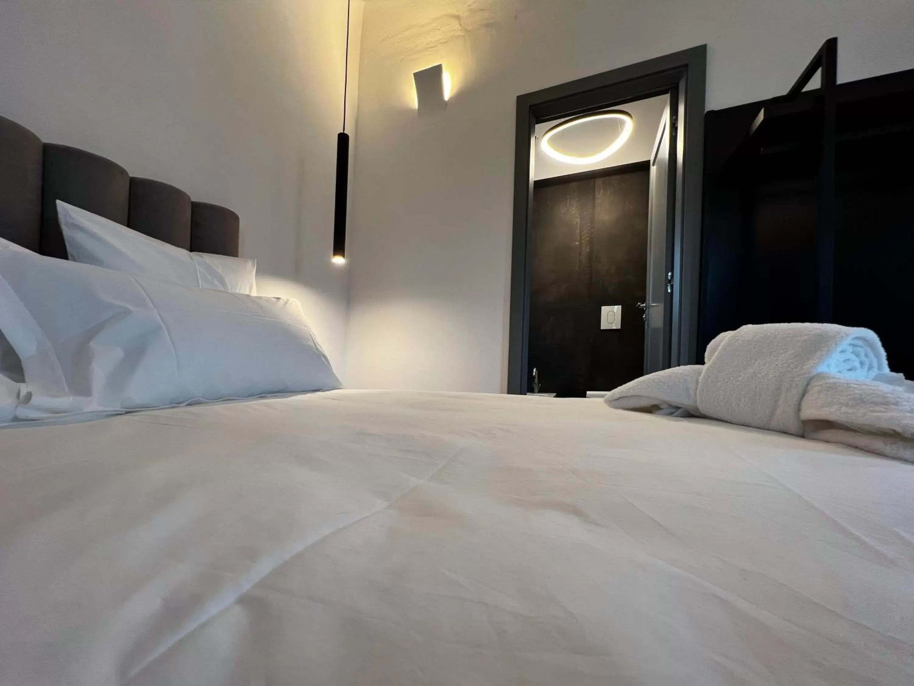 Bed in Gioiamia - Luxury Rooms in Cattedrale