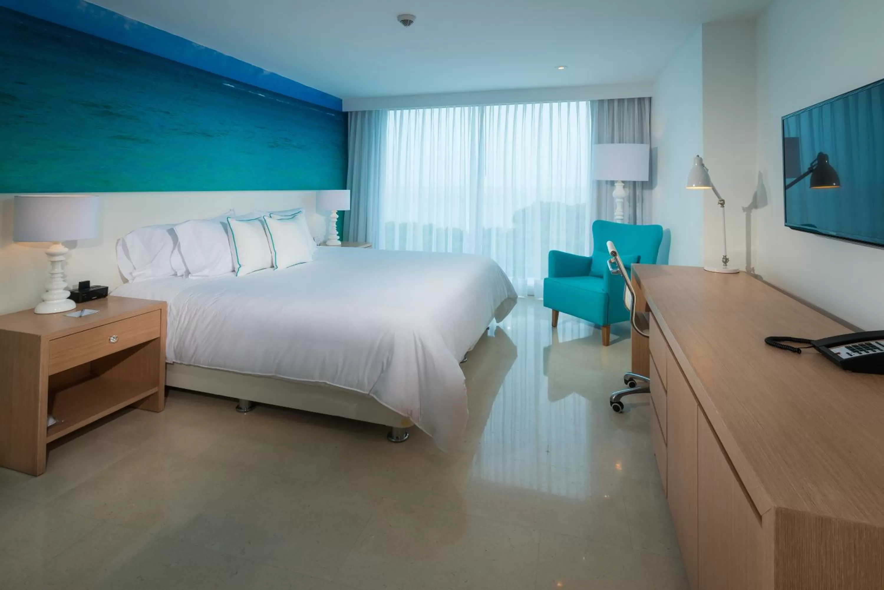 Photo of the whole room, Bed in Radisson Cartagena Ocean Pavillion Hotel