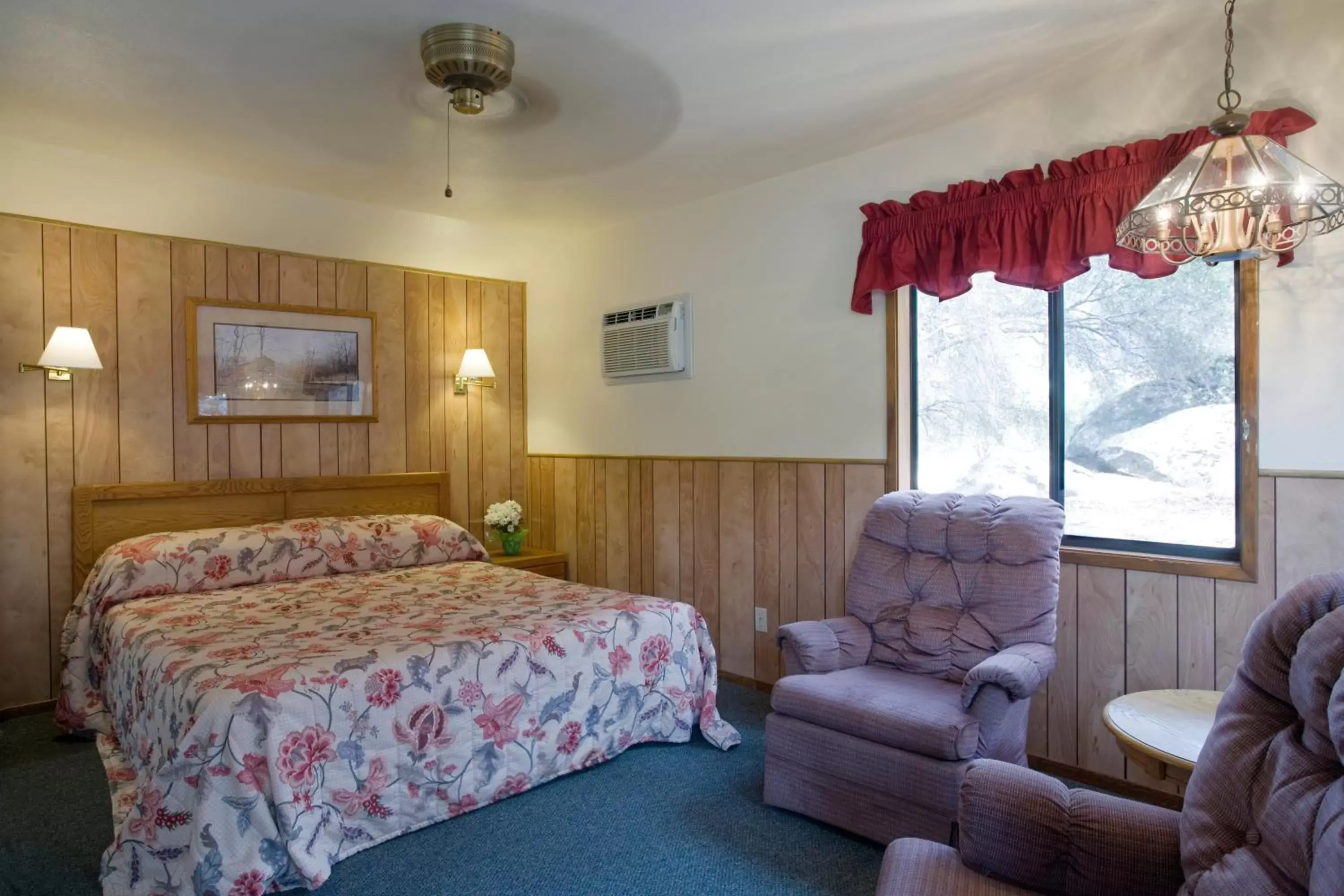 Bed in Lazy J Ranch Motel
