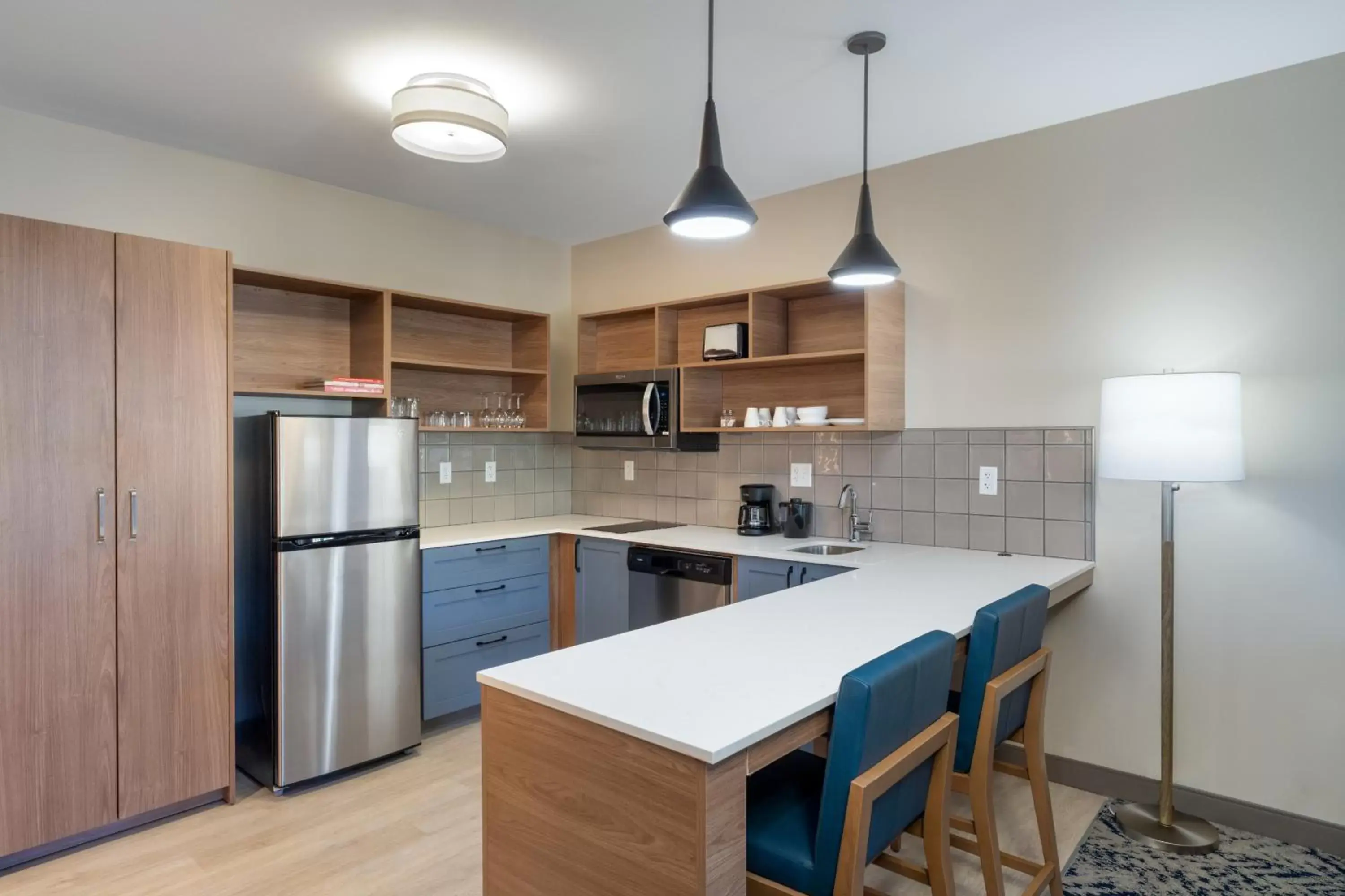 Kitchen or kitchenette, Kitchen/Kitchenette in Candlewood Suites - Asheville Downtown, an IHG Hotel