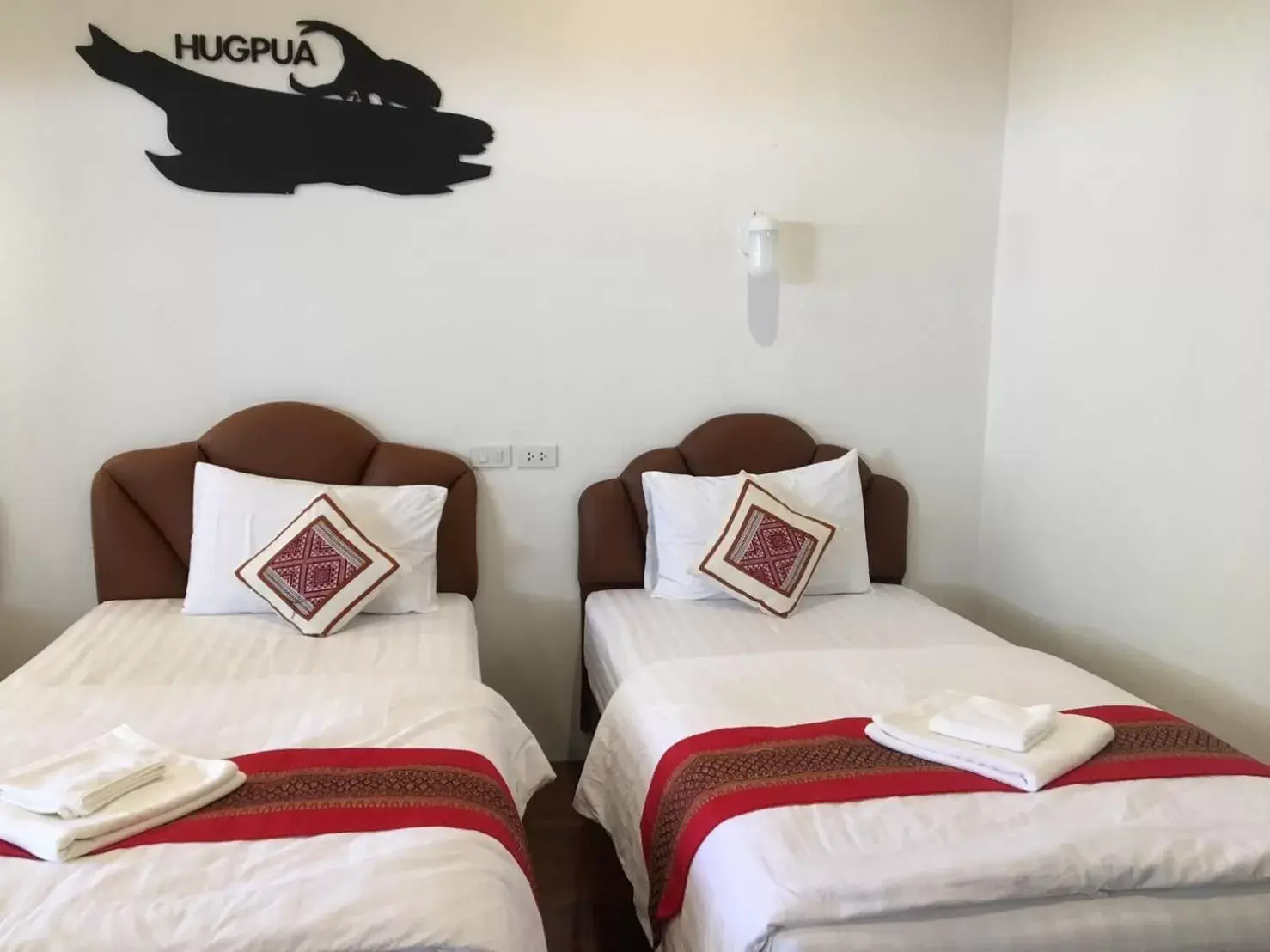 Bed in Hugpua Hotel