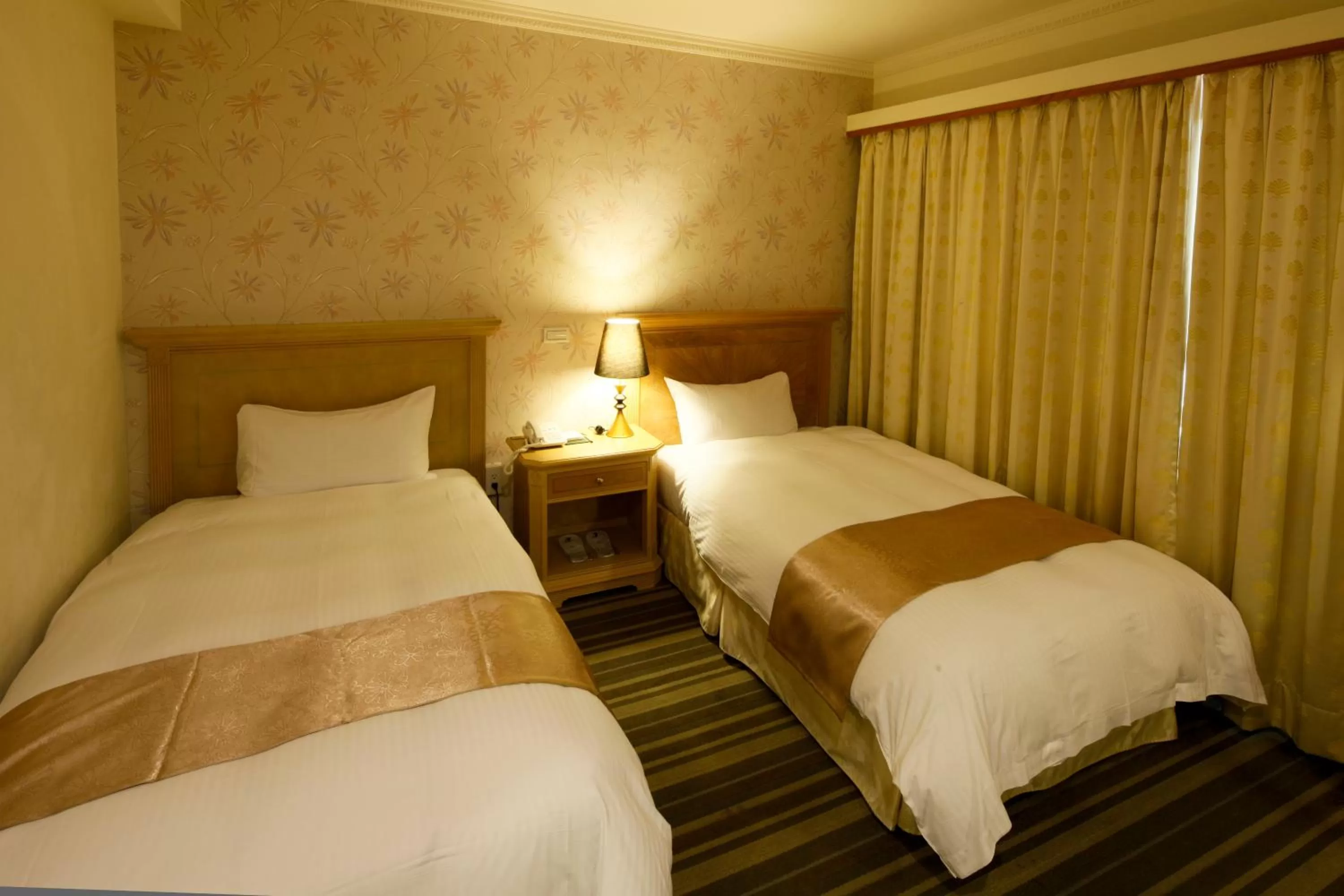 Bed in Cambridge Tainan Hotel