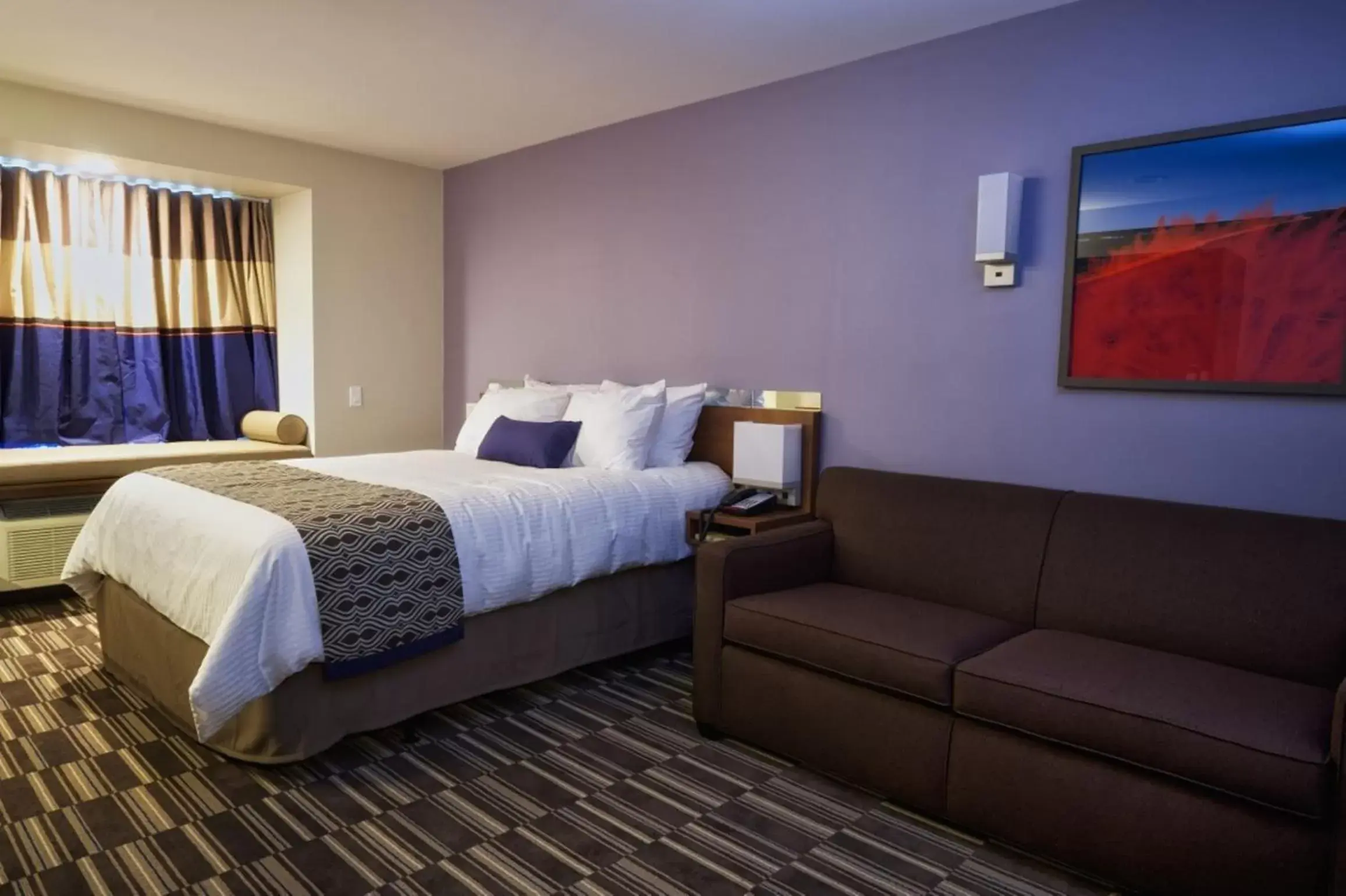 Bed in Microtel Inn & Suites Sault Ste. Marie