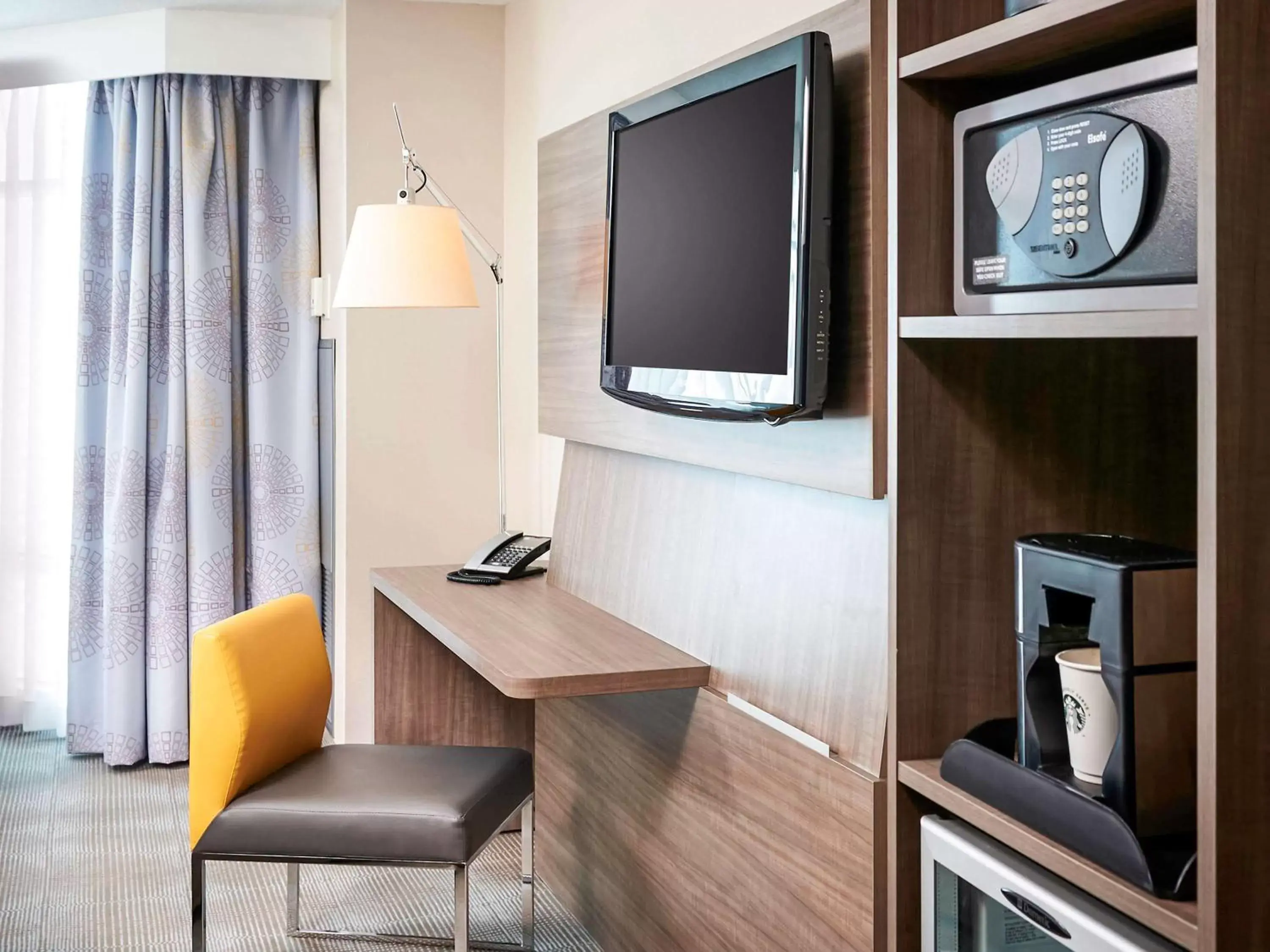 Photo of the whole room, TV/Entertainment Center in Novotel Toronto North York