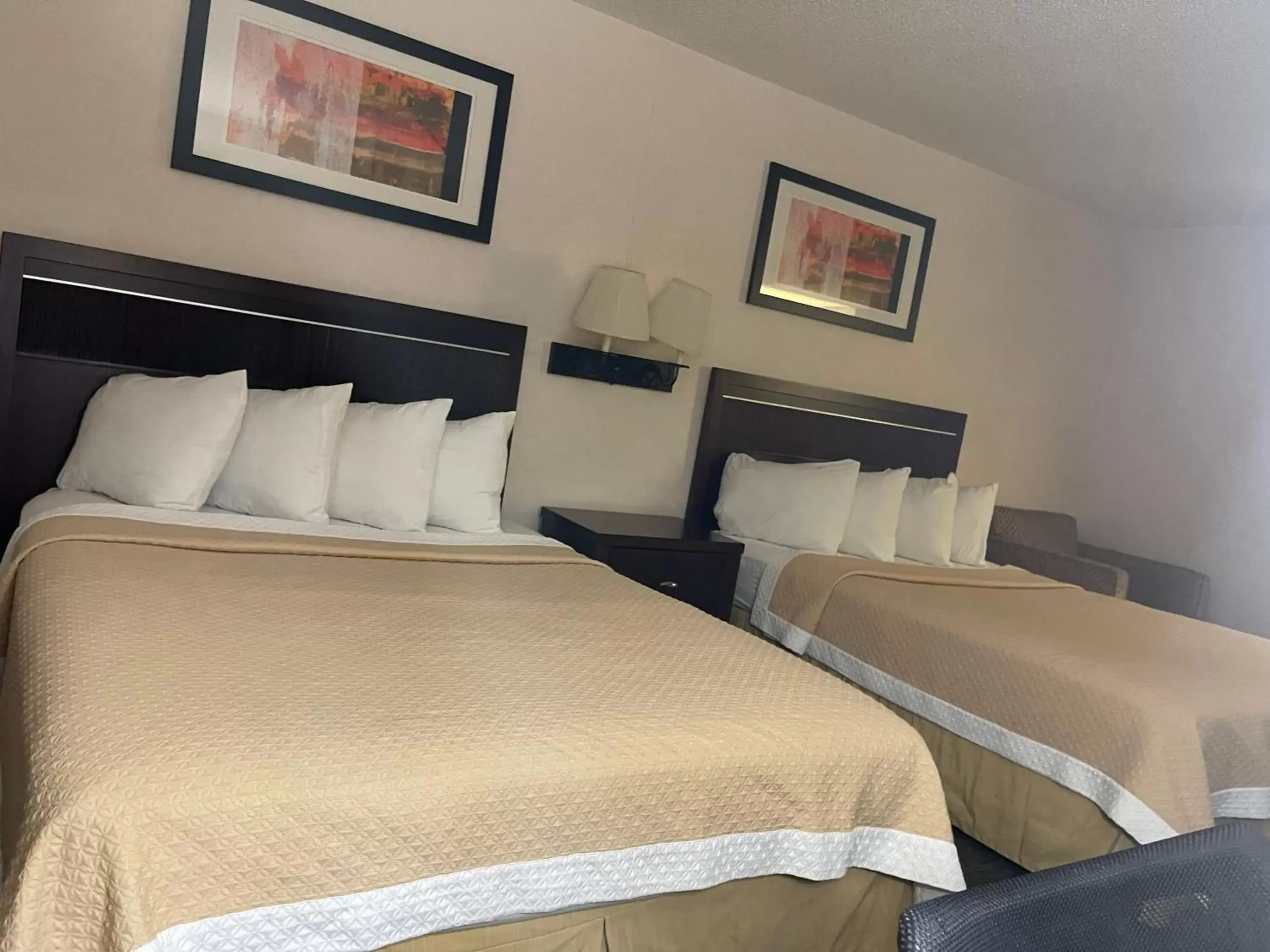 Bed in Days Inn & Suites by Wyndham Denver International Airport