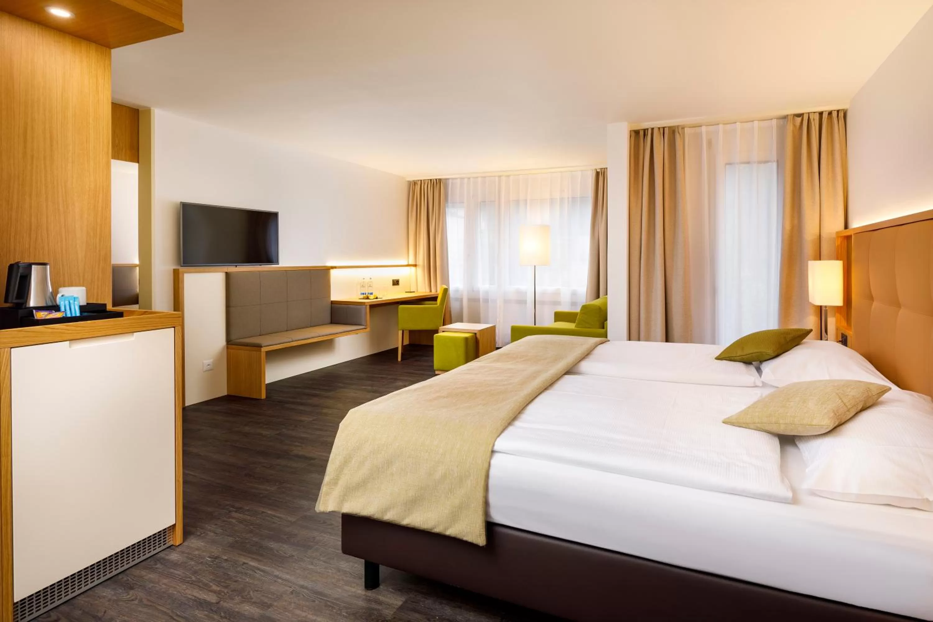 Photo of the whole room, Bed in Ramada by Wyndham Baden Hotel du Parc