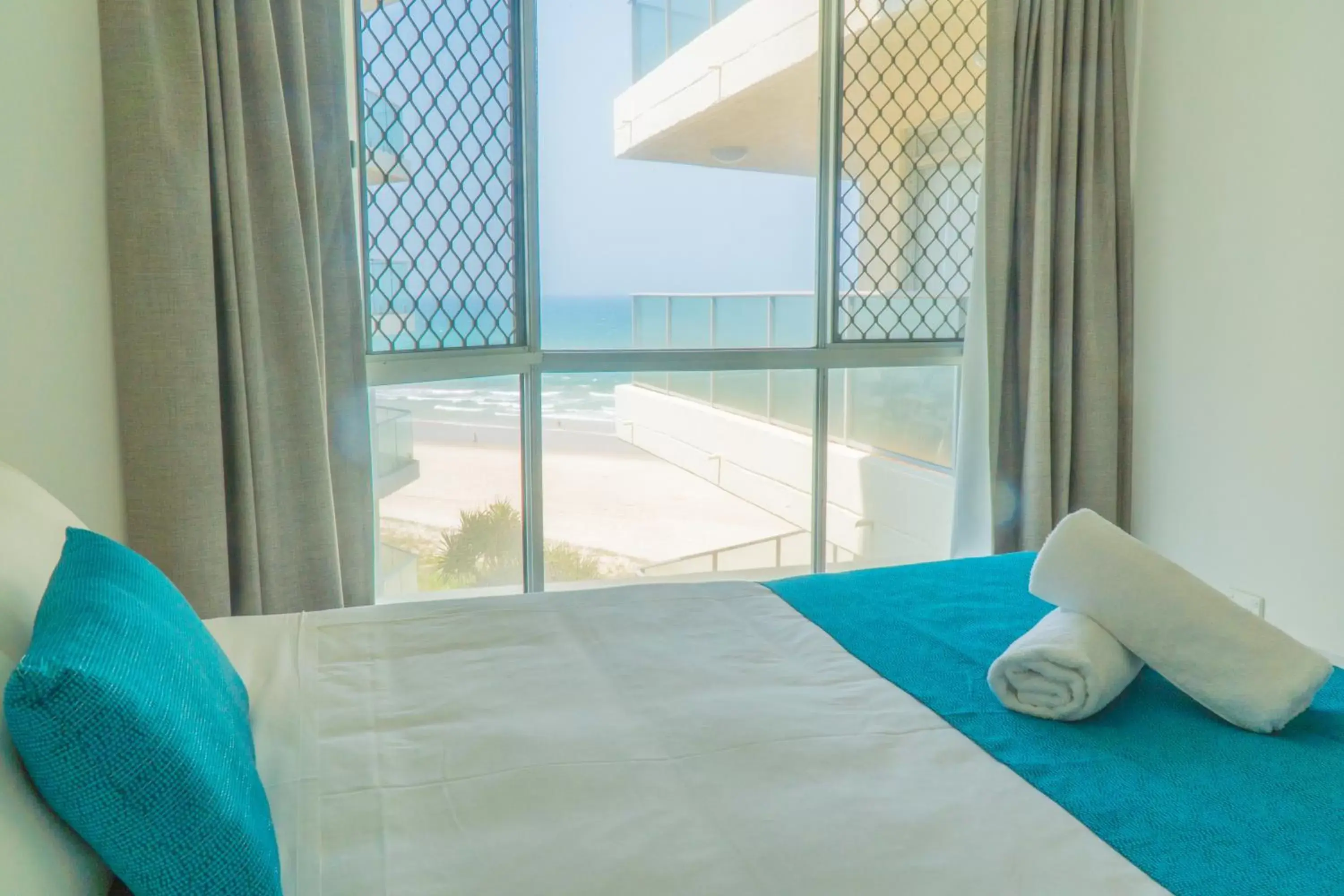 Bed in Foreshore Beachfront Apartments