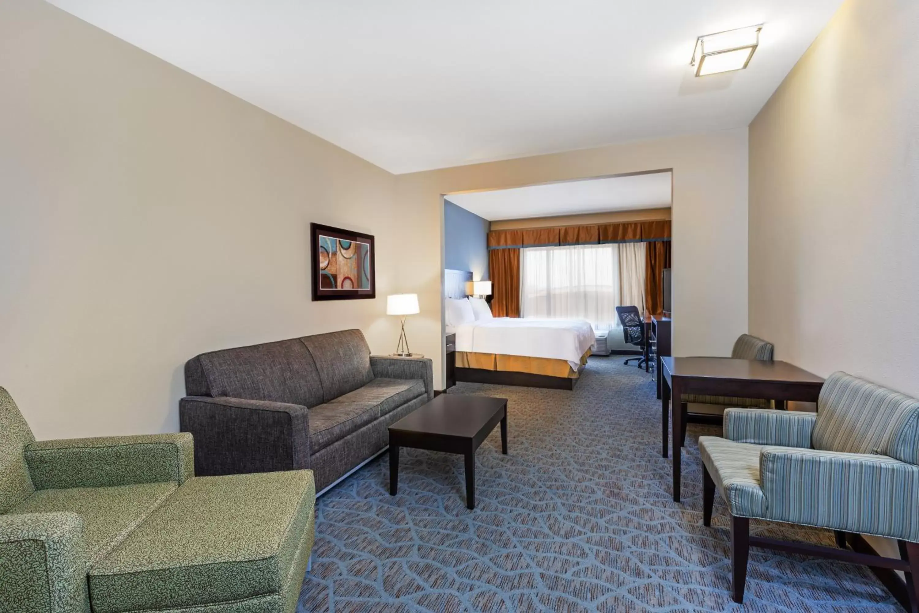 Bedroom, Seating Area in Holiday Inn Express Hotel & Suites Floresville, an IHG Hotel