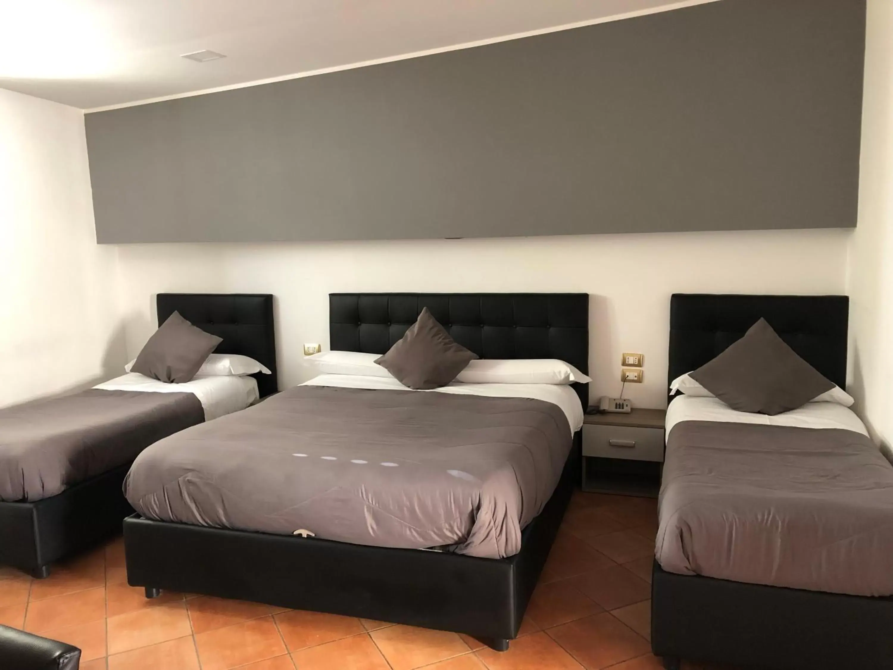 Bed in Hotel Nettuno