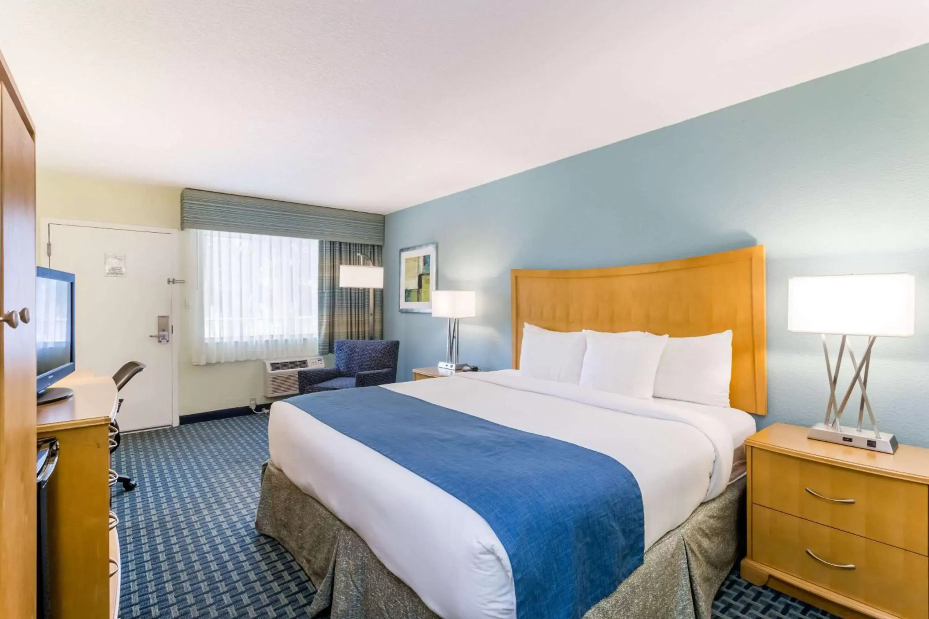 Photo of the whole room, Bed in Days Inn by Wyndham Cocoa Beach Port Canaveral