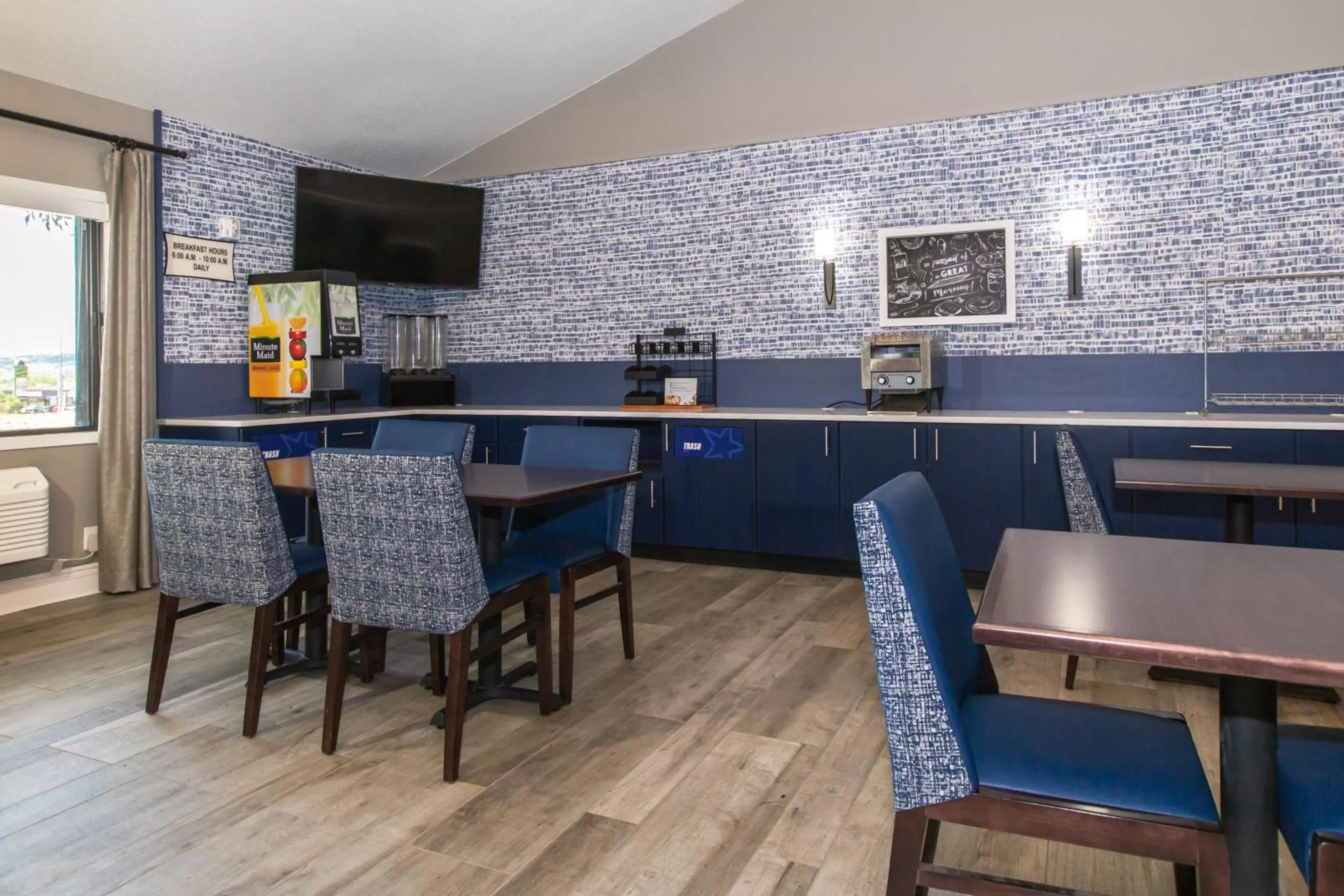 Dining area in AmericInn by Wyndham Rapid City