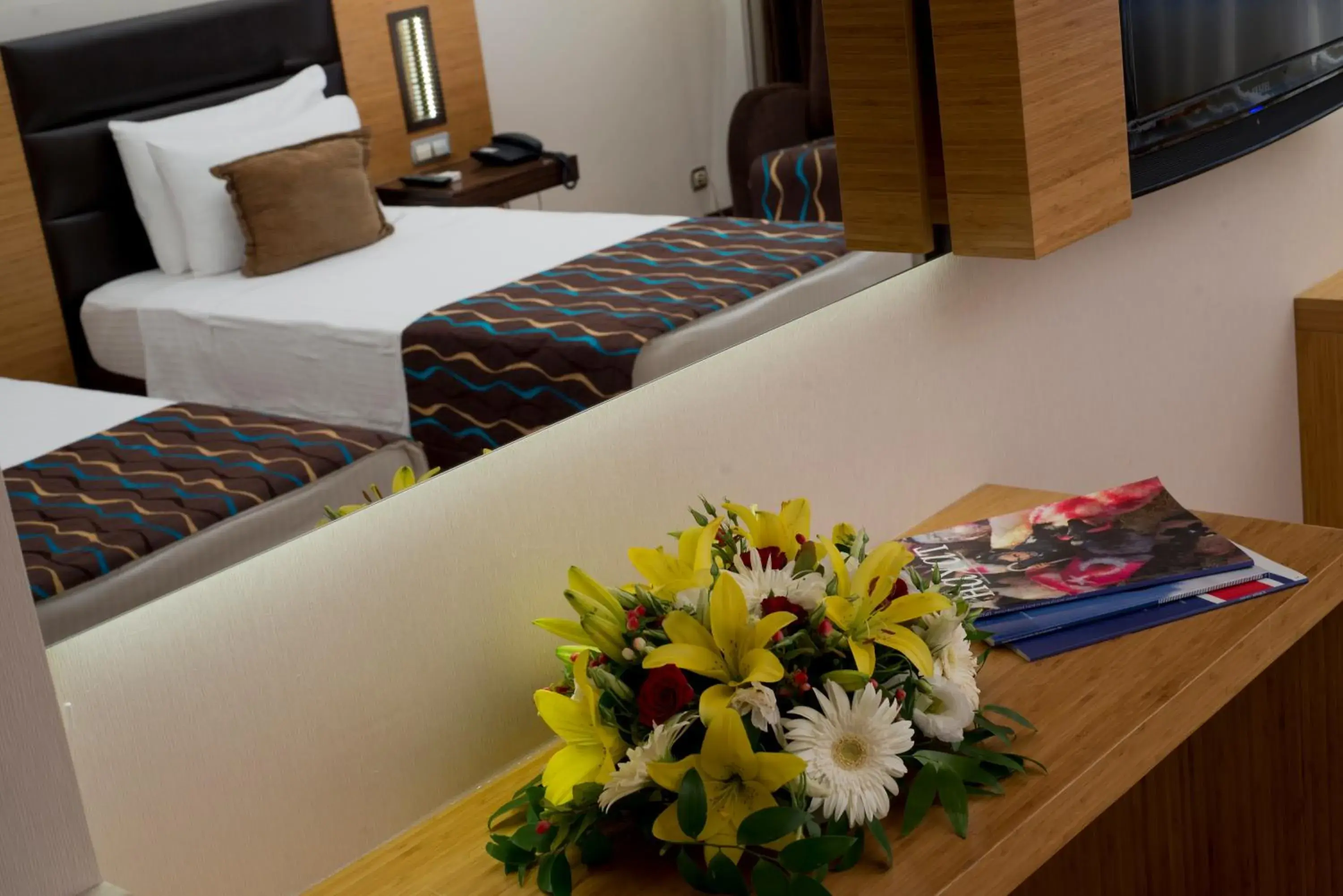 Living room, Bed in North Point Hotel Denizli