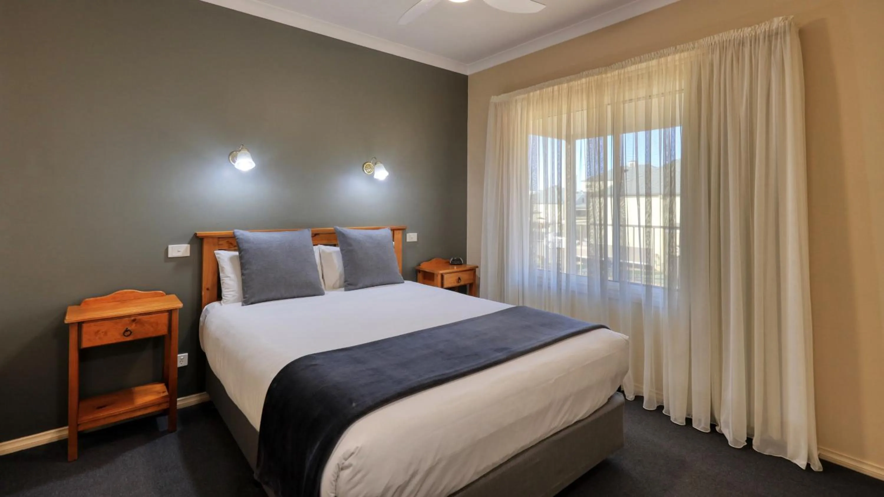 Bed in Bridges on Meninya Motel & Apartments