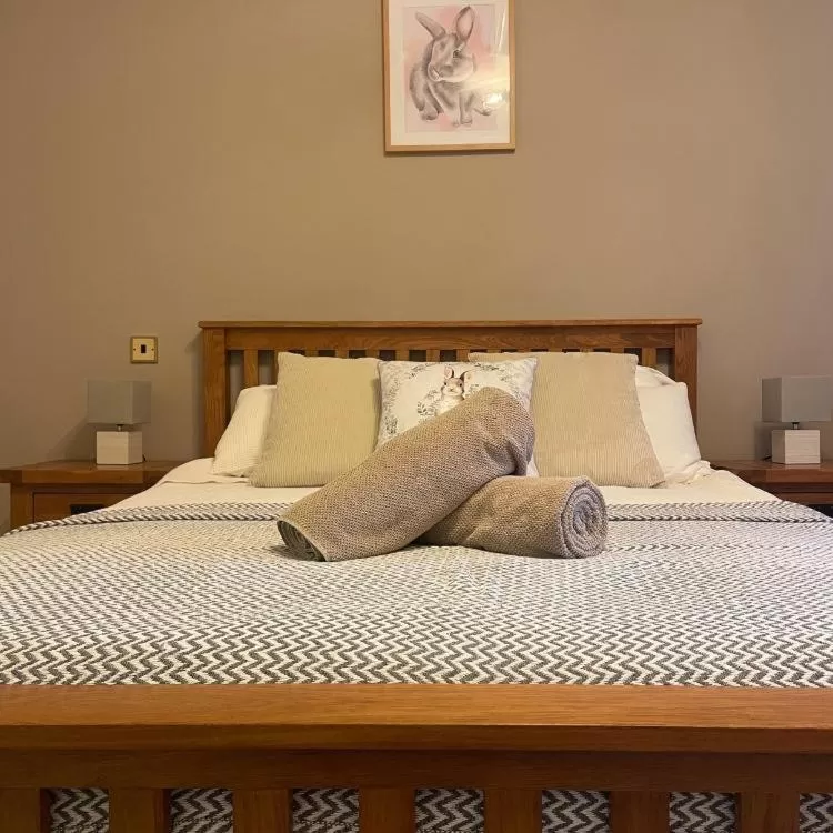 Bed in The Cottage Inn