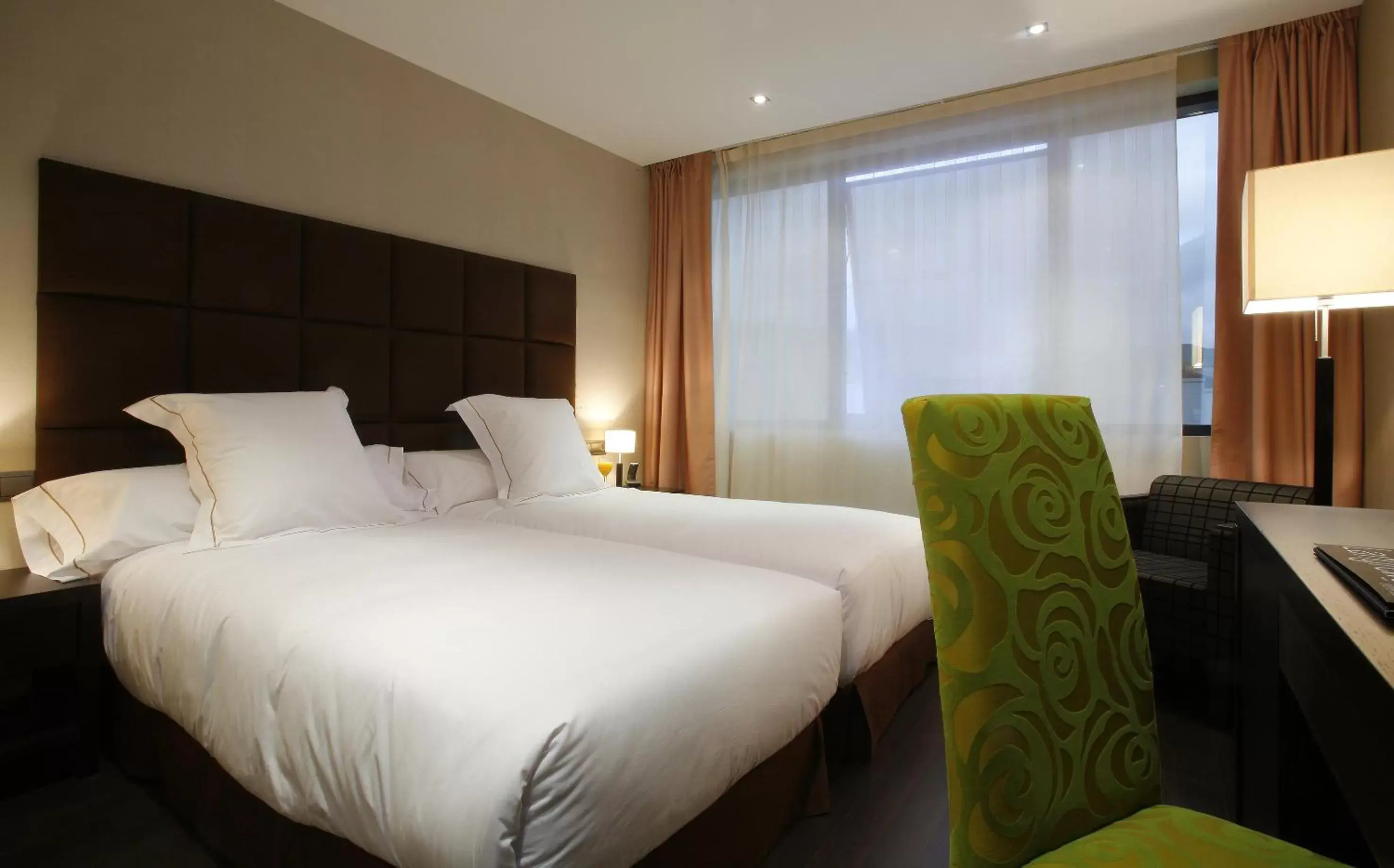 Bed in AZZ Asturias Langrehotel & Spa