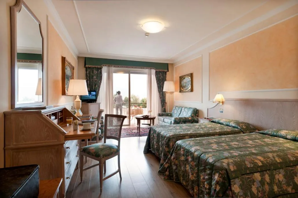 Photo of the whole room, Bed in Grand Hotel Dino