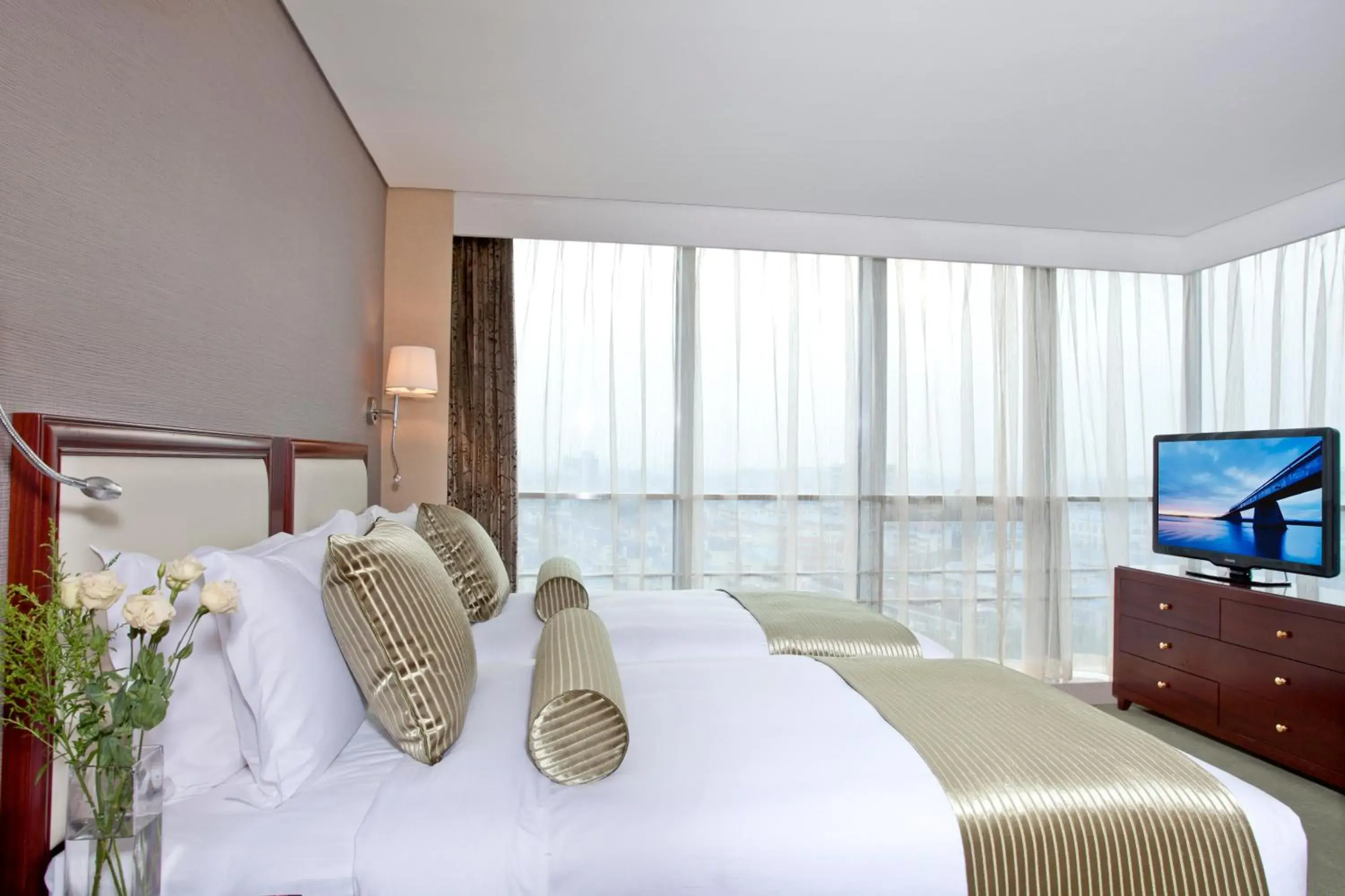 Bedroom, Bed in Regal Plaza Hotel & Residence