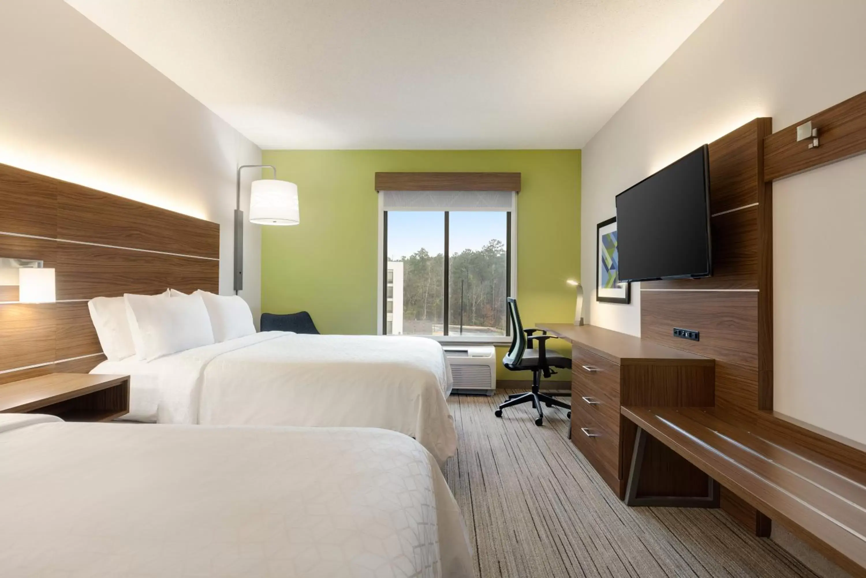 Bed in Holiday Inn Express Hotel & Suites Opelika Auburn, an IHG Hotel