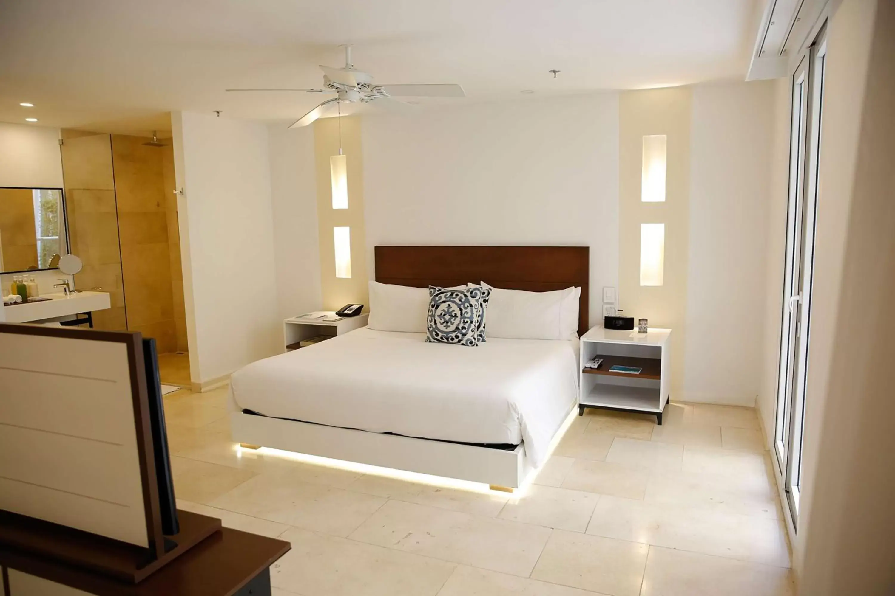 Bed in Nacar Hotel Cartagena, Curio Collection by Hilton