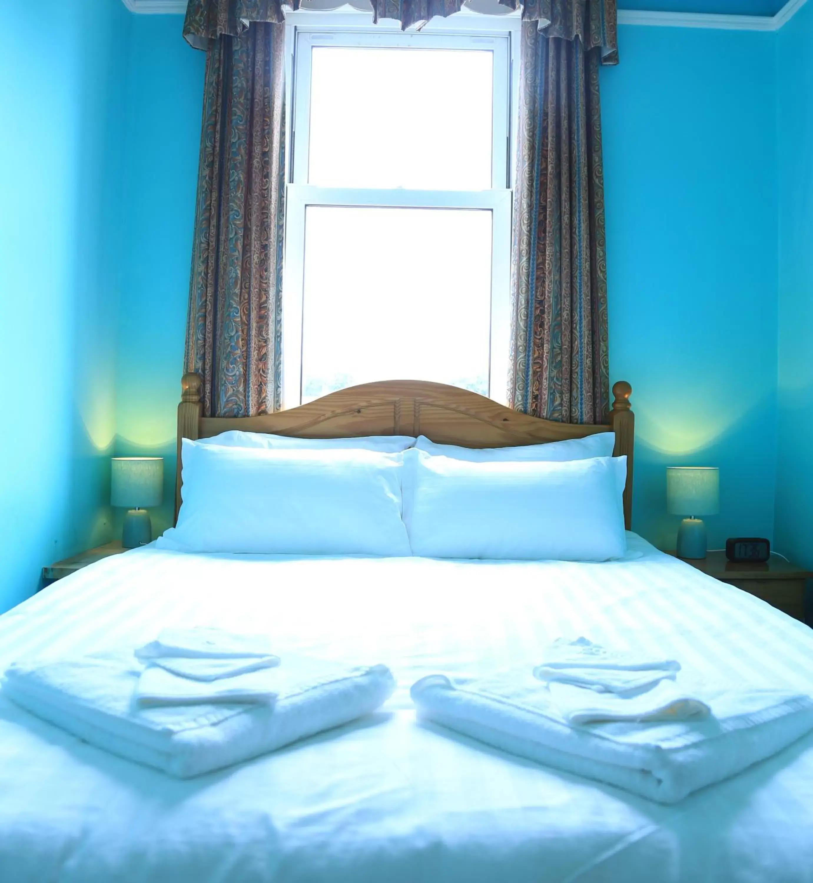 Decorative detail, Bed in Twin Lions Hotel