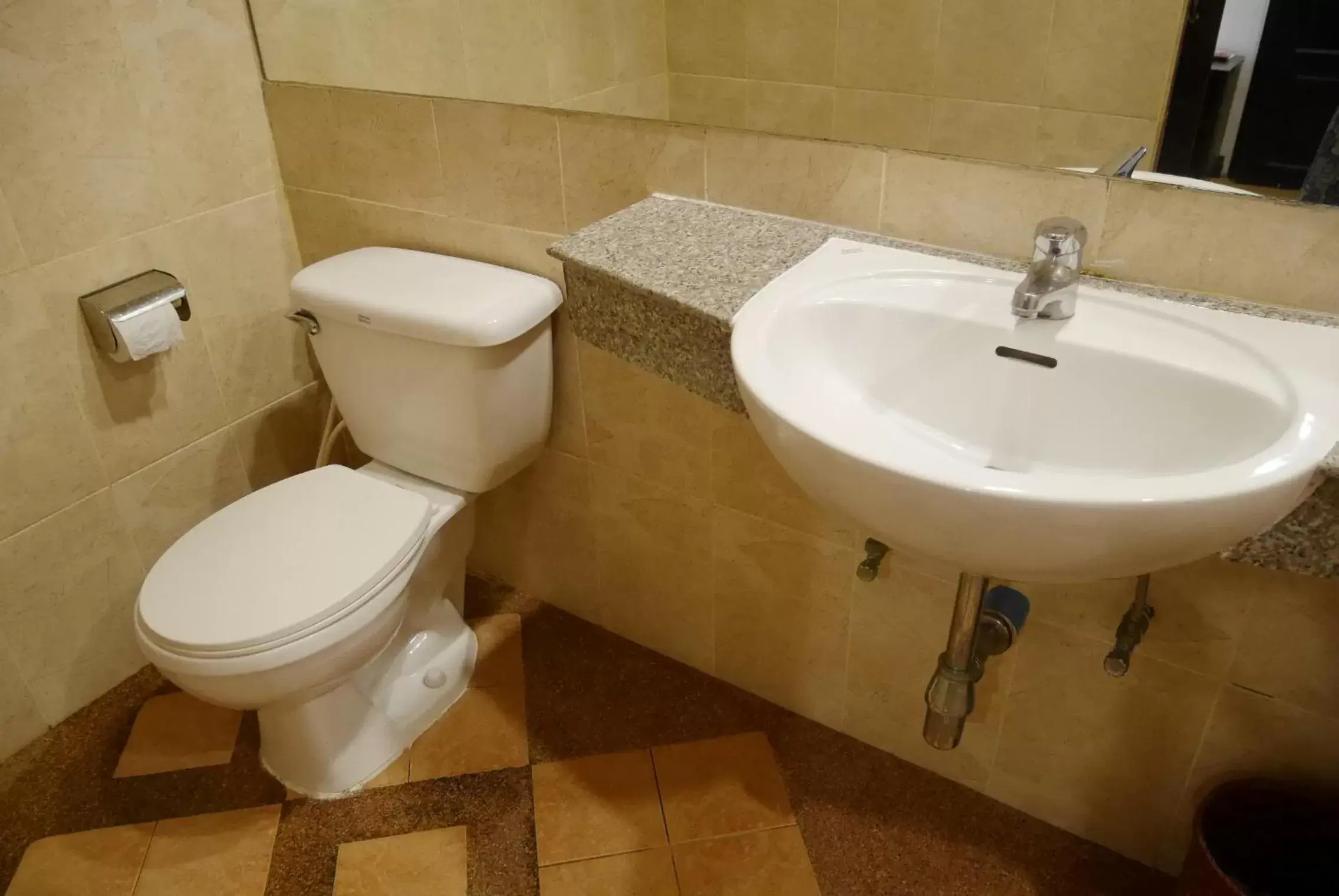 Bathroom in Roma Hotel