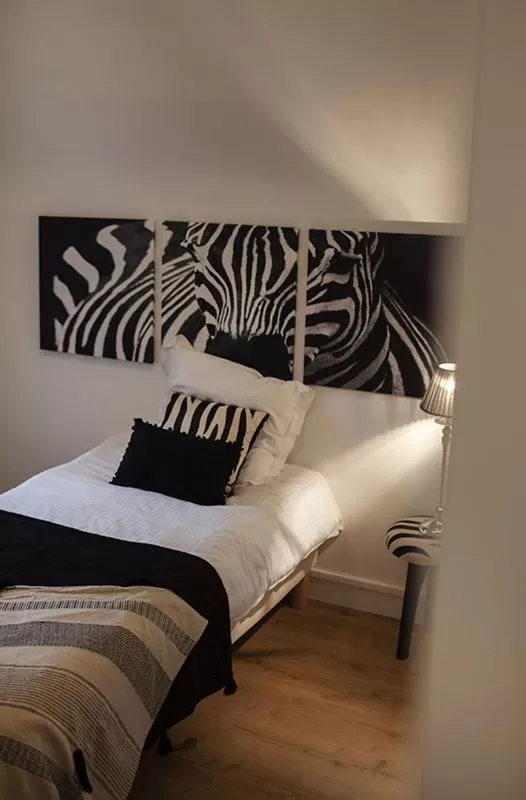 Bed in Bienvenue Chez Nous