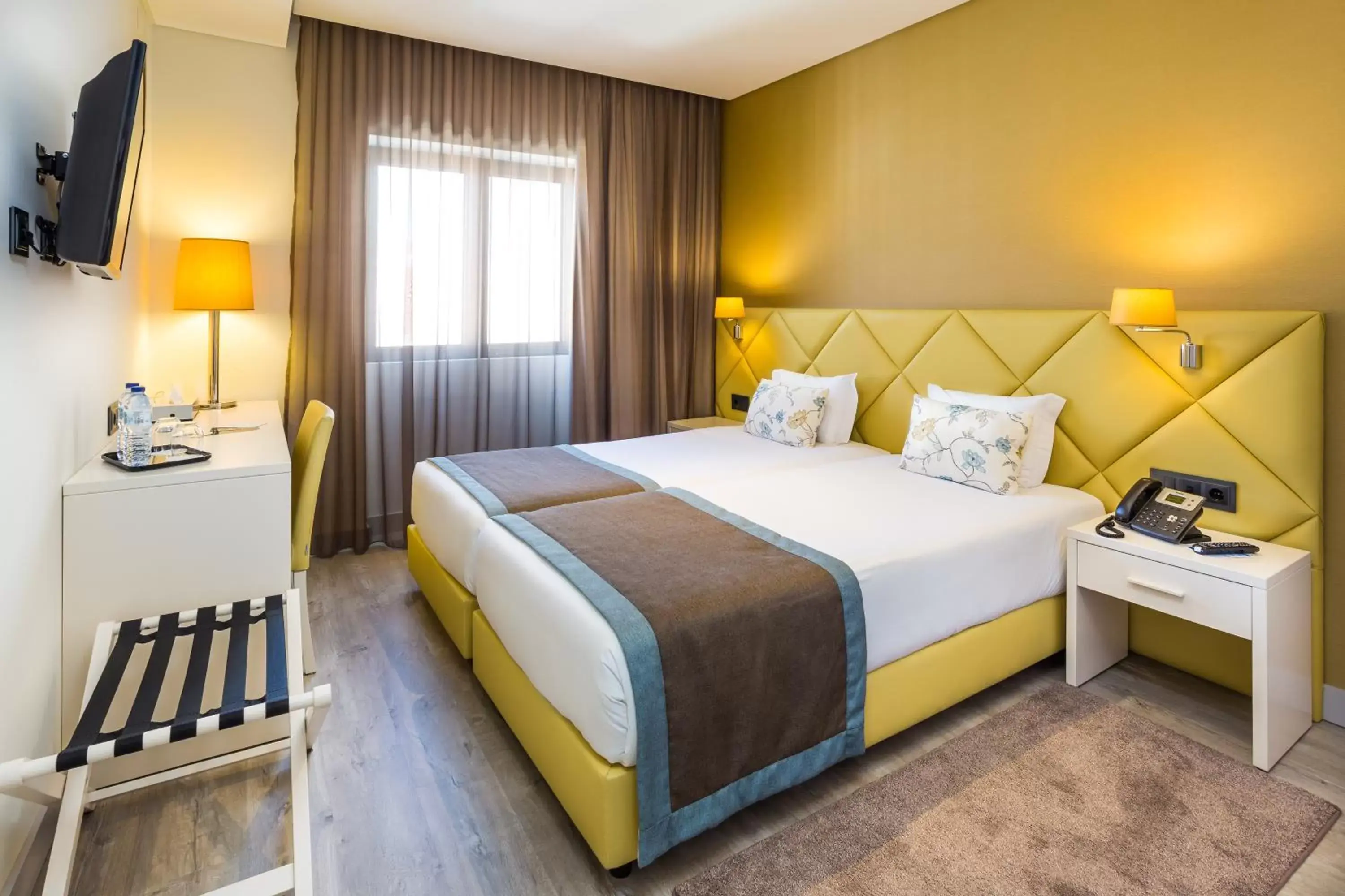 Bedroom in Empire Lisbon Hotel