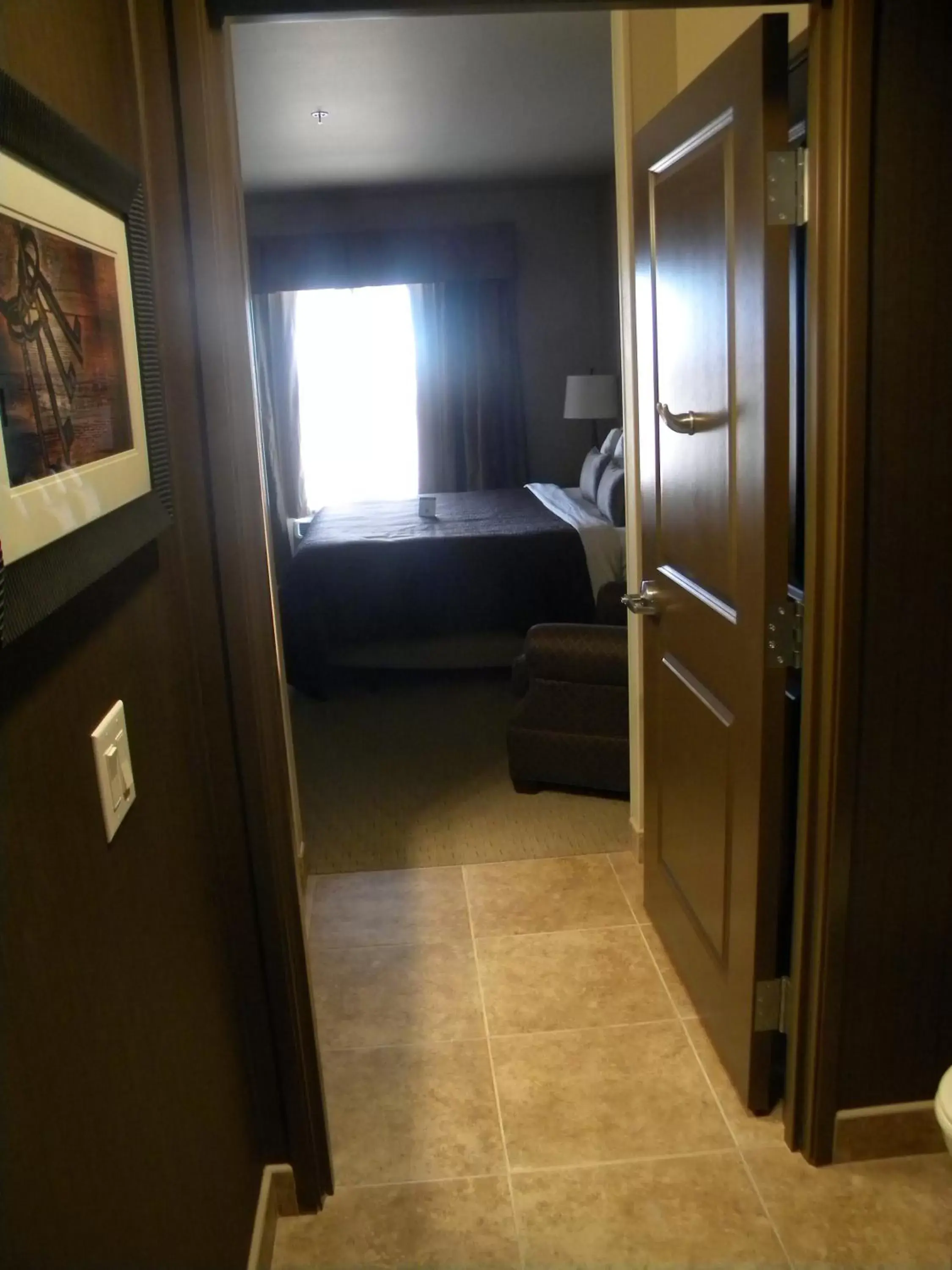 Bed, Bathroom in Teddy's Residential Suites Watford City