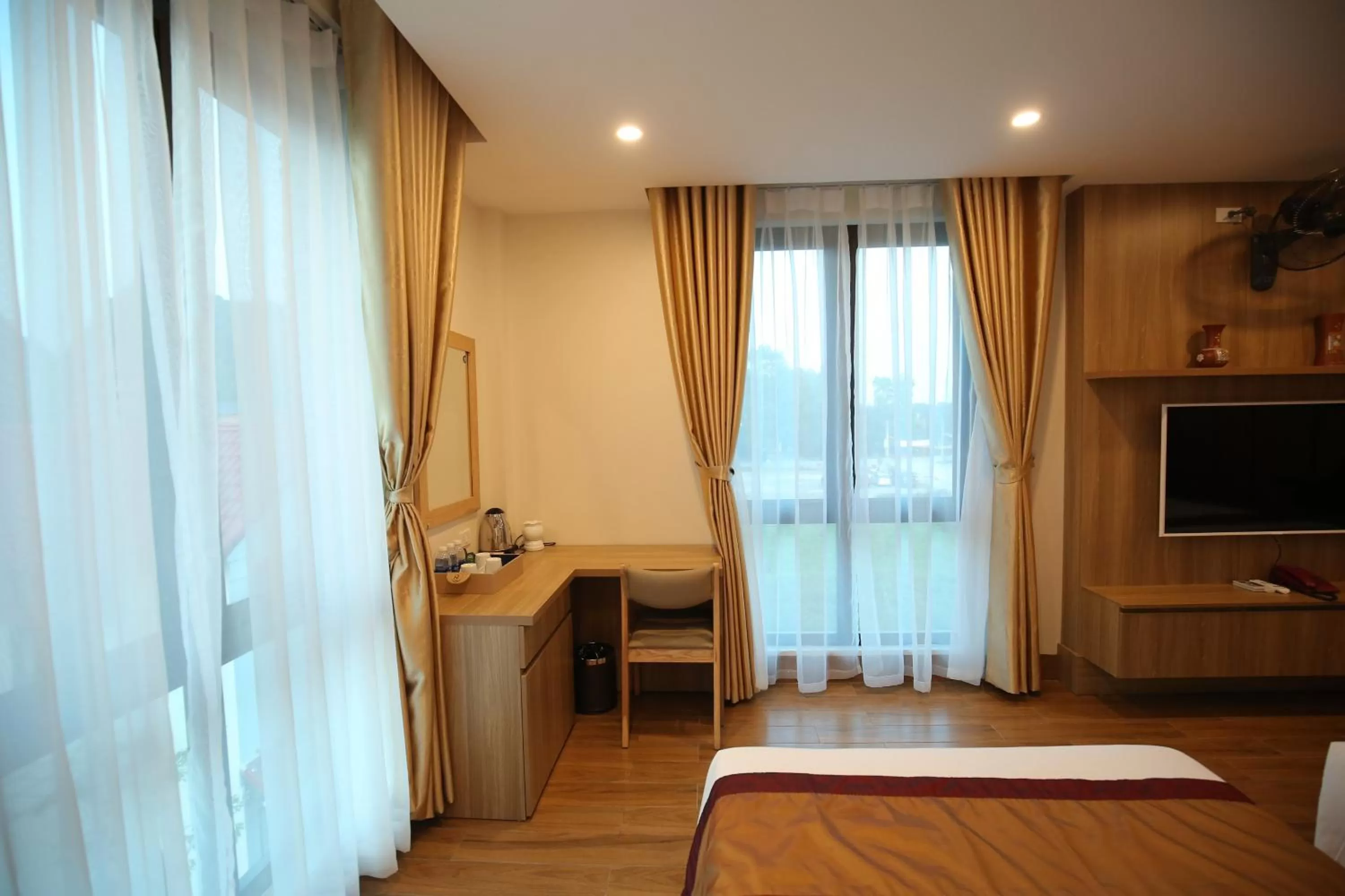 TV and multimedia, Bed in Cozynibi Hotel