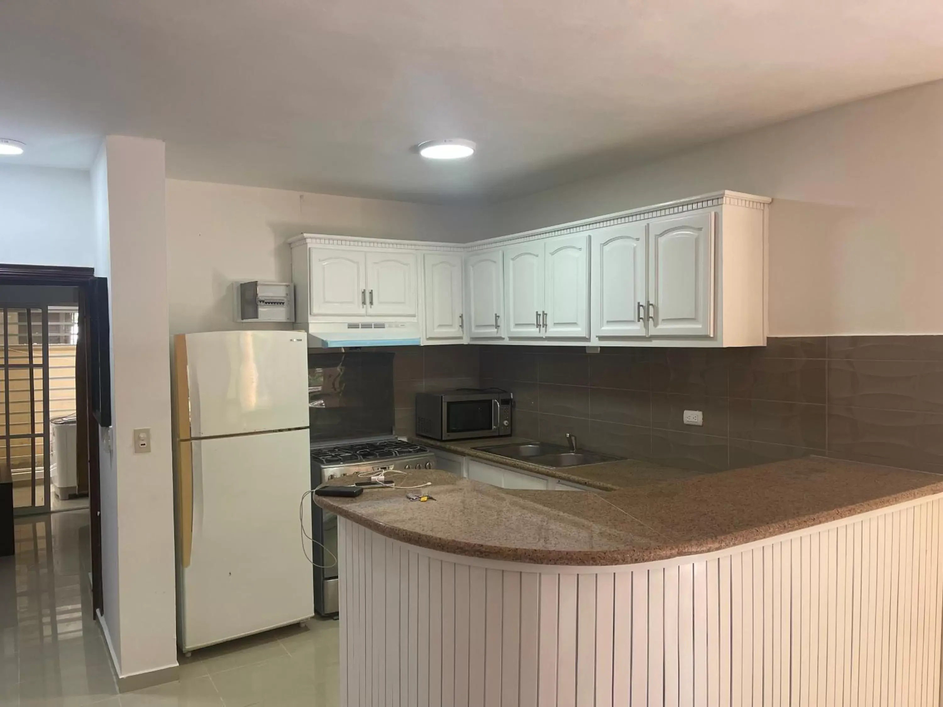 Kitchen/Kitchenette in Yonah comfort punta cana, shared apartment