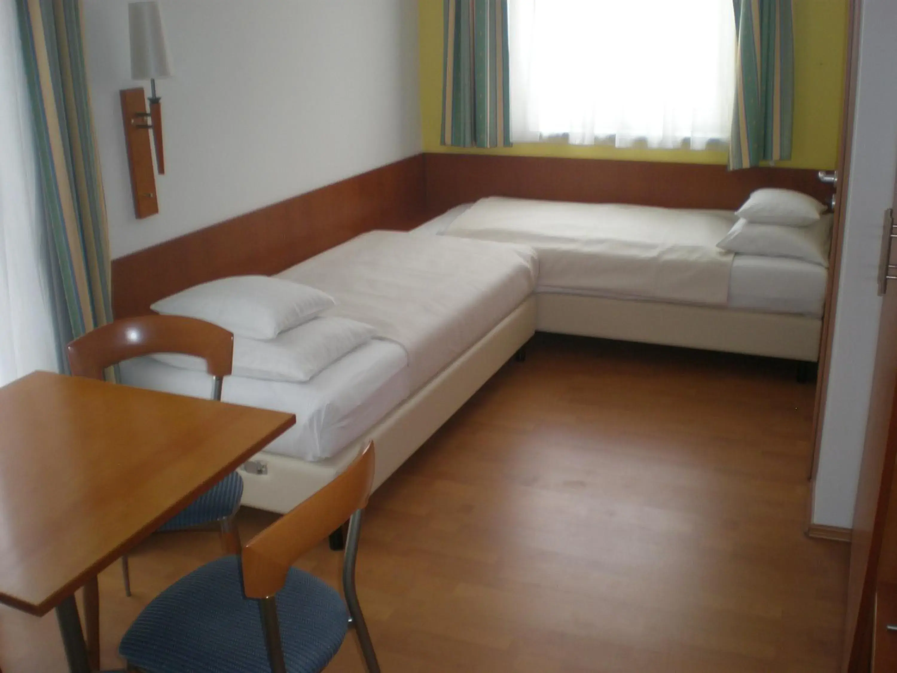 Bed, Seating Area in Hotel Veritas