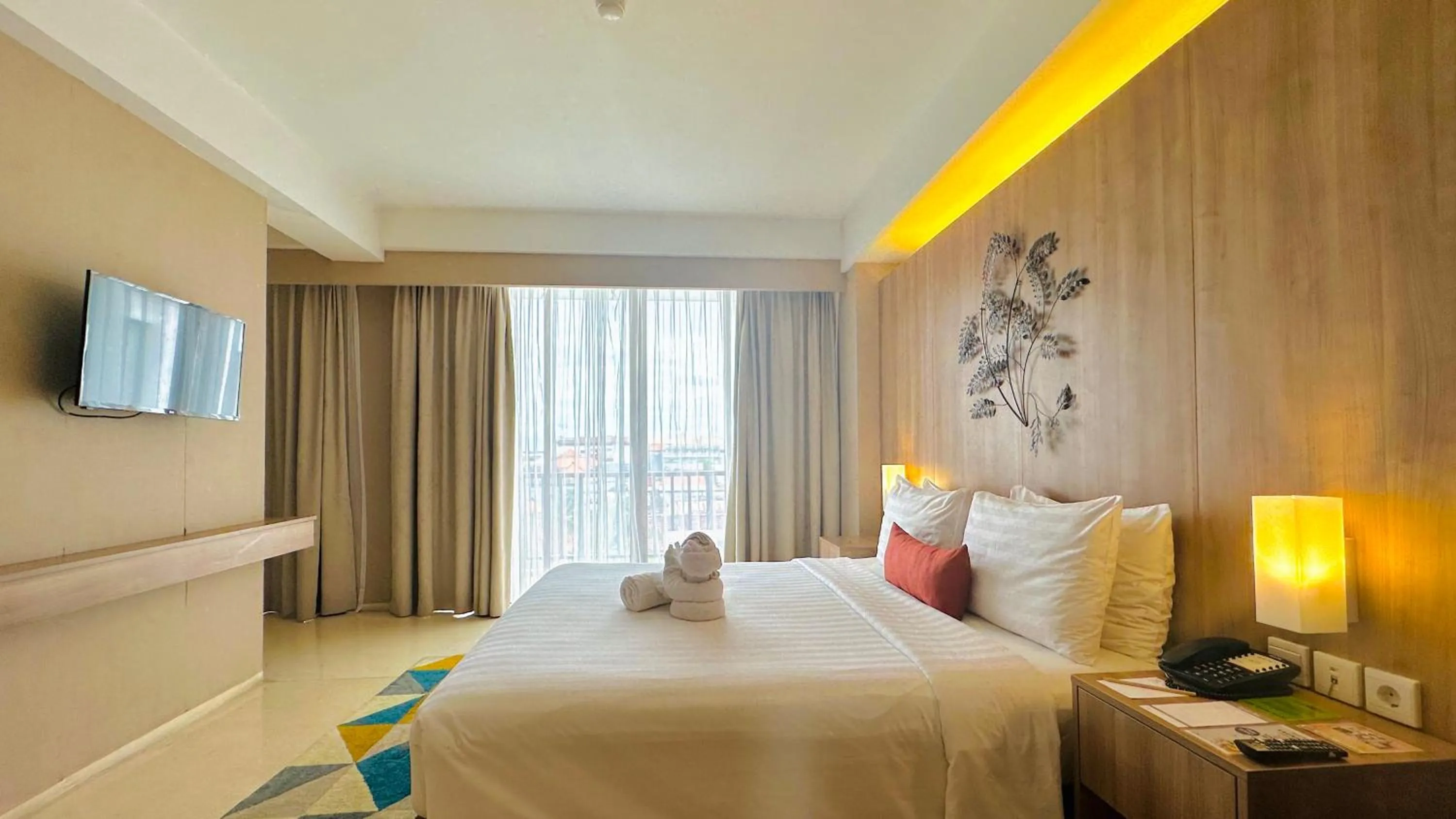 Junior Suite with Balcony in Grand Zuri Kuta Bali