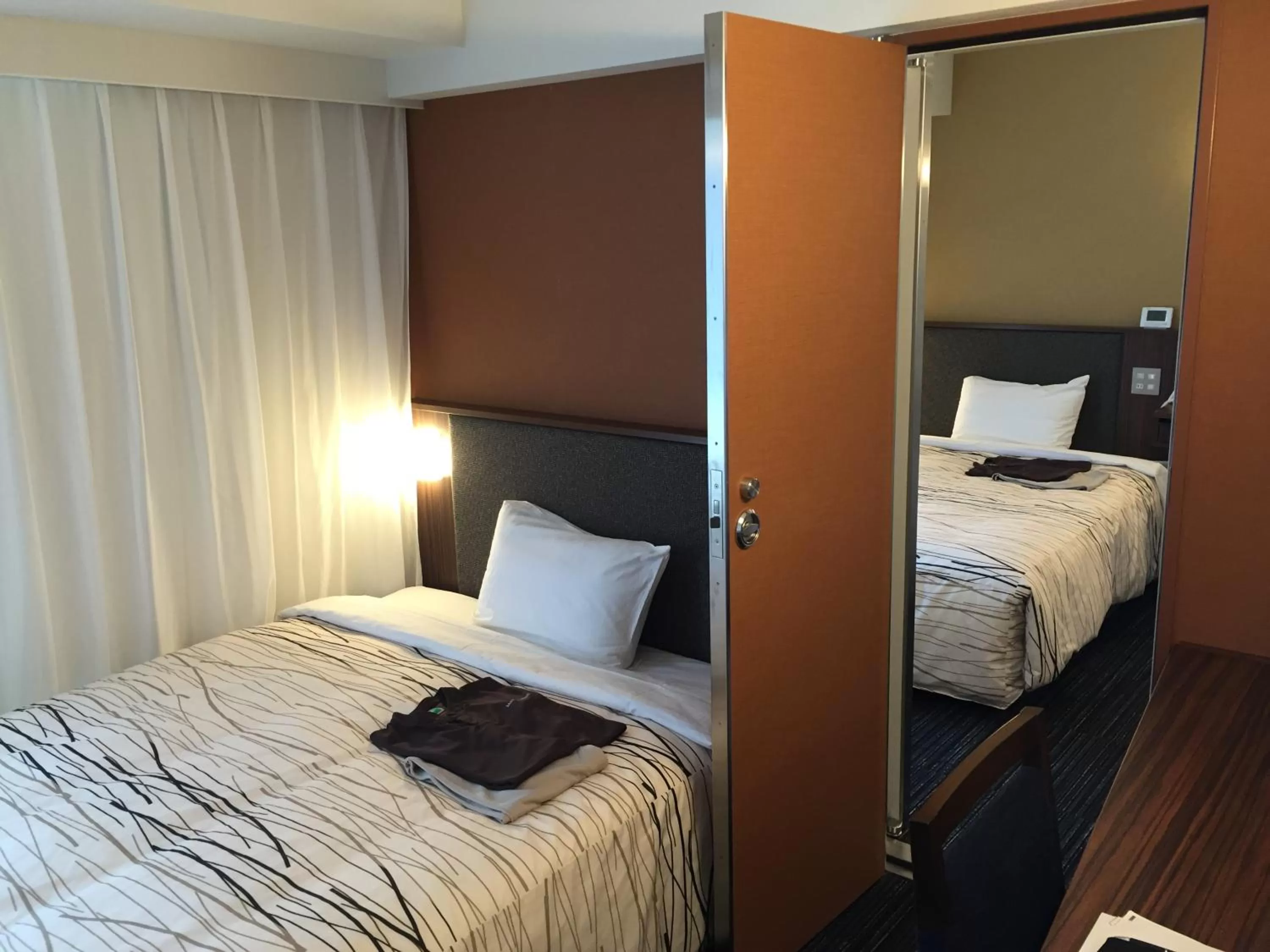 Photo of the whole room, Bed in Fukui Manten Hotel Ekimae