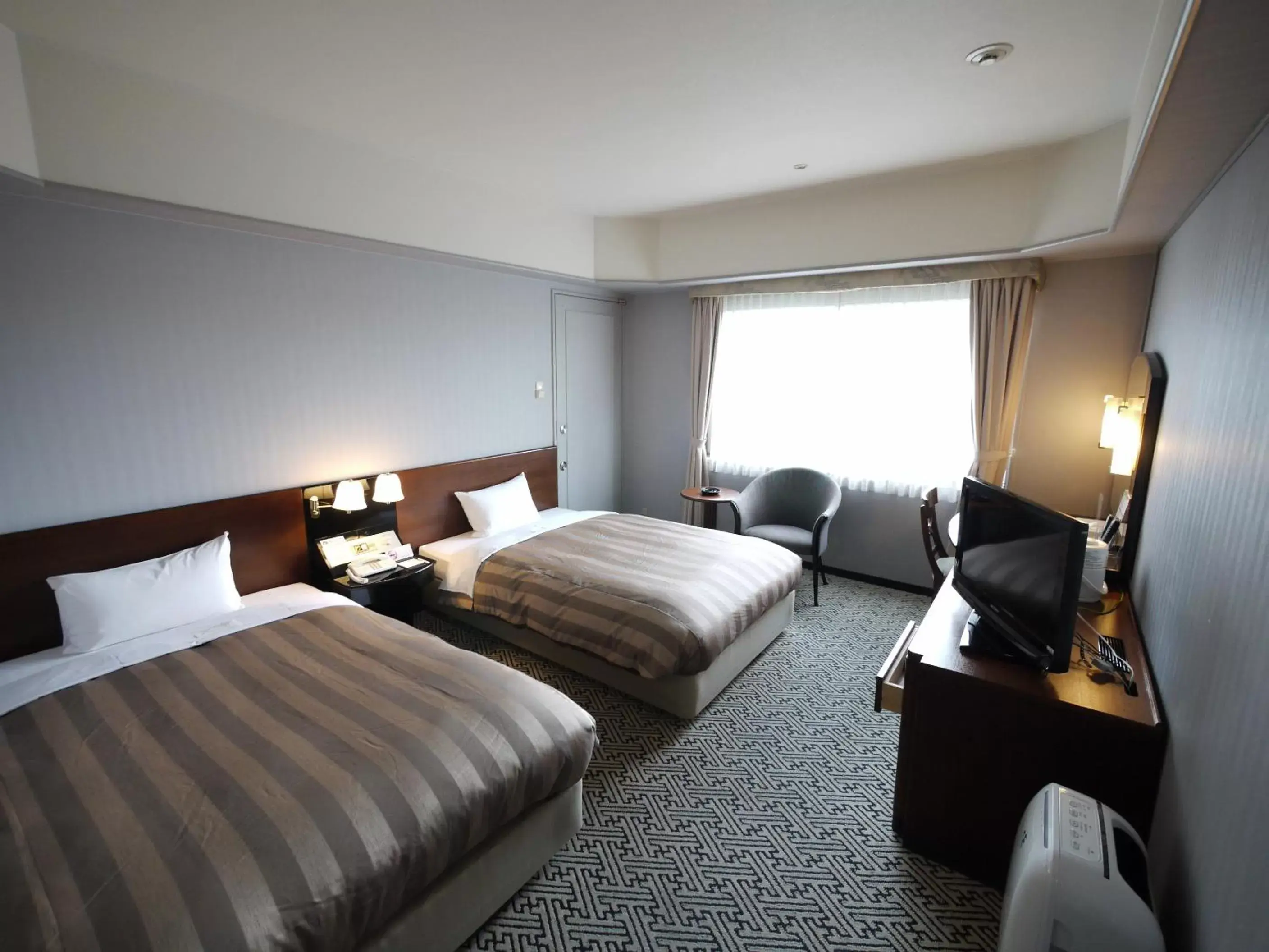 Photo of the whole room, Bed in Ark Hotel Kumamotojo Mae -ROUTE INN HOTELS-