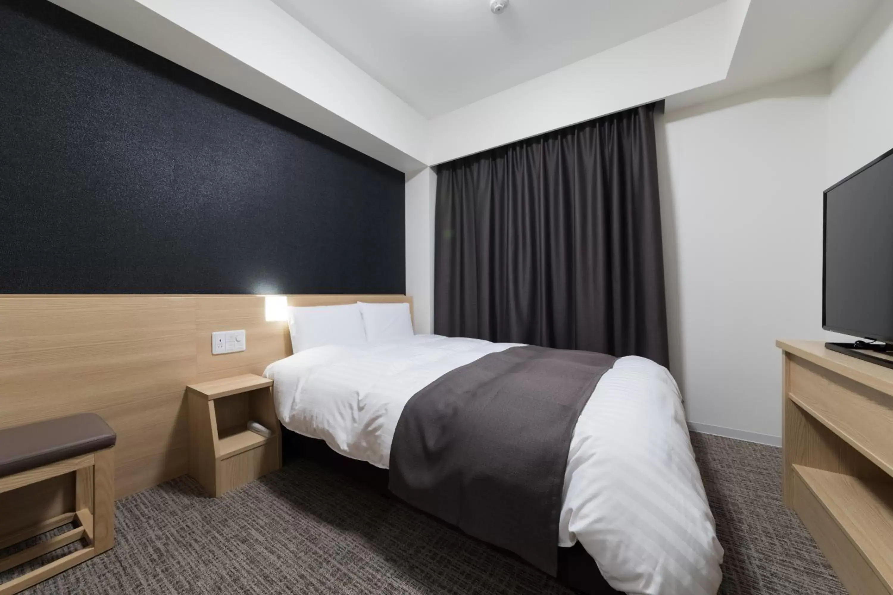 Photo of the whole room, Bed in Dormy Inn Matsuyama Natural Hot Spring