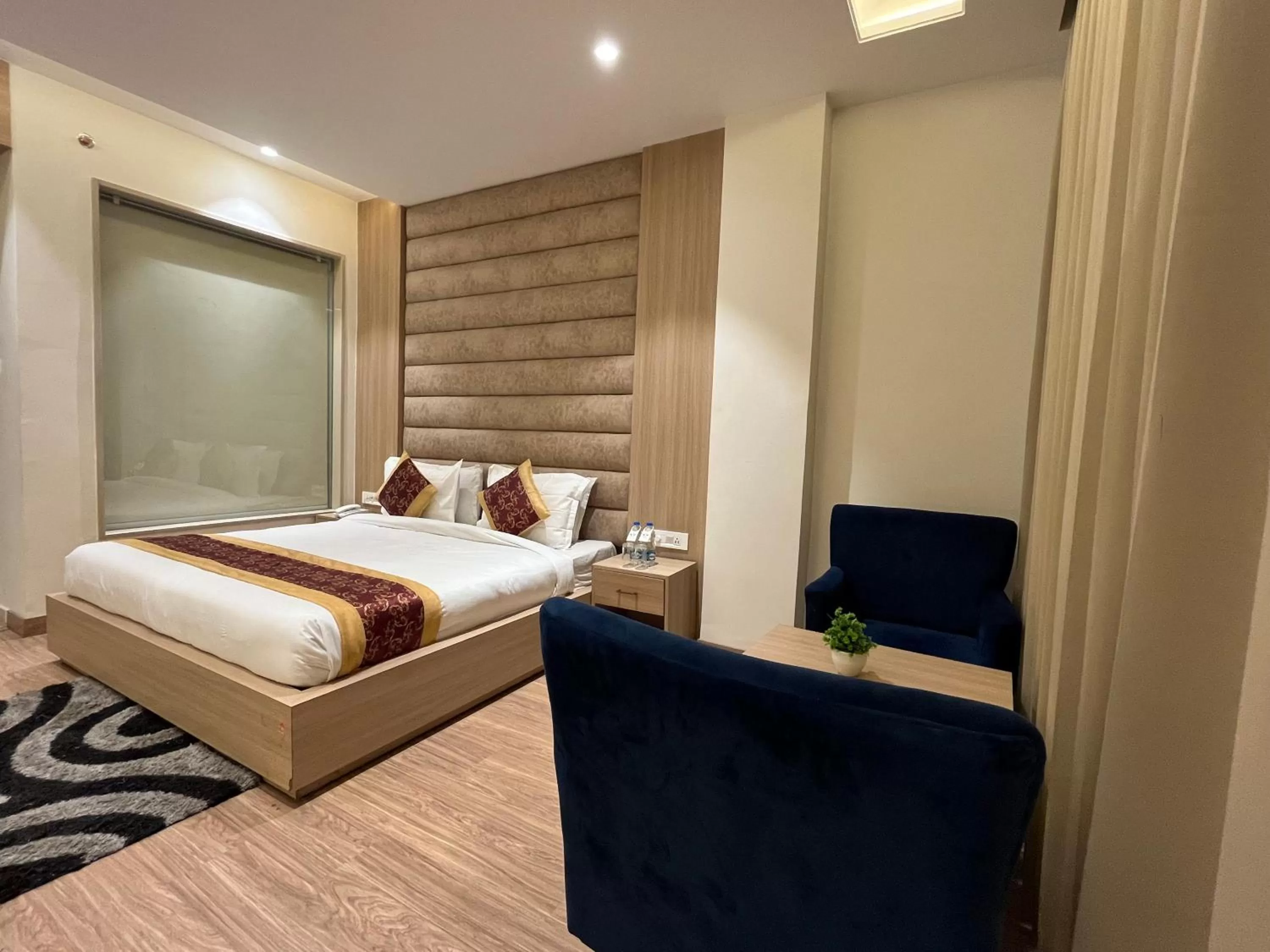 Photo of the whole room, Bed in RRV Hotel