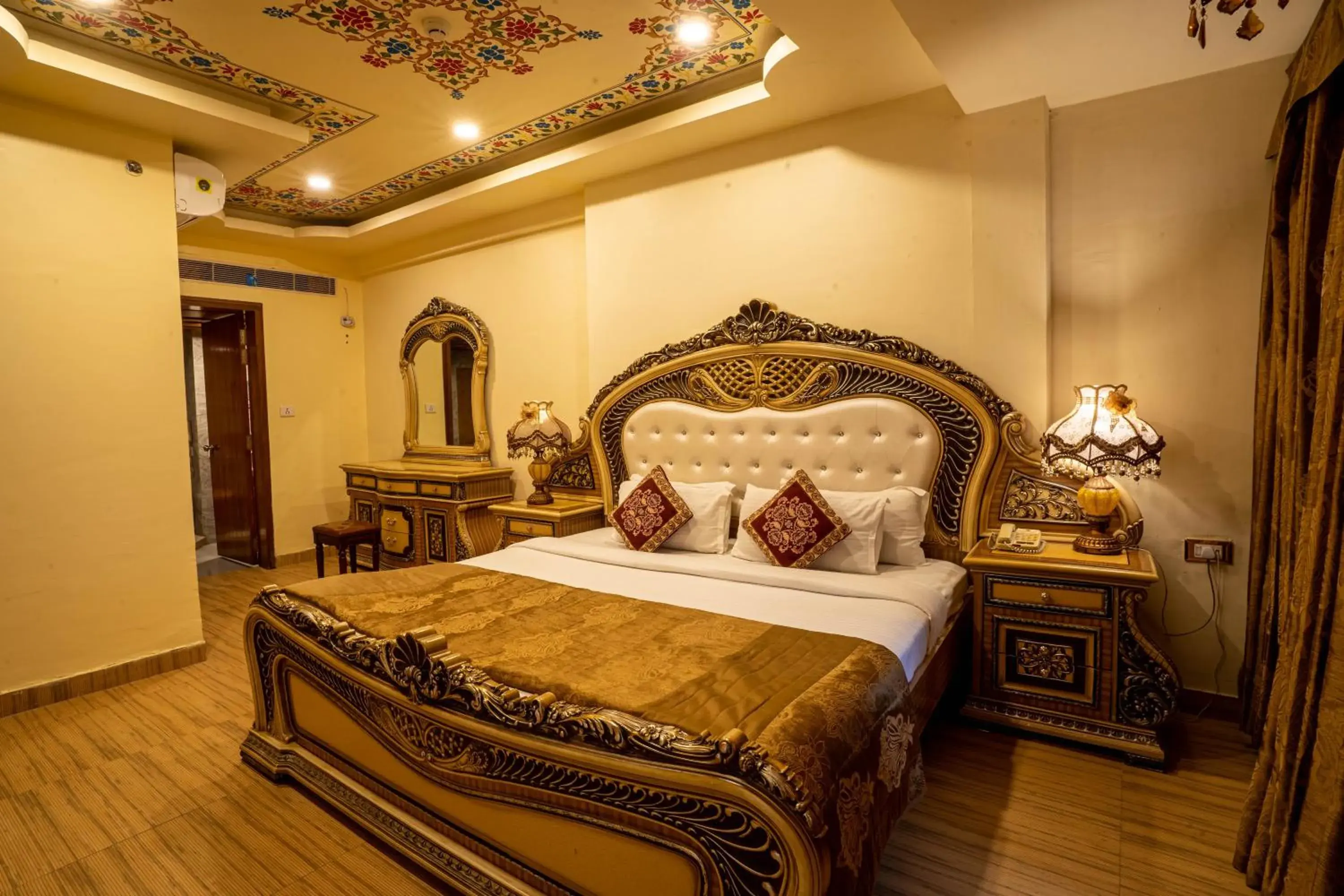 Bed in Chokhi Dhani - The Palace Hotel