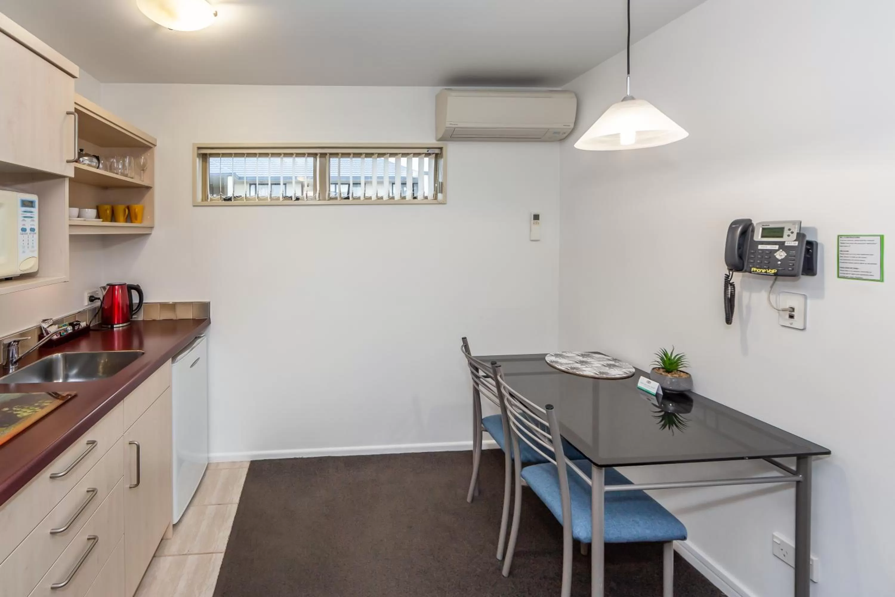 Kitchen or kitchenette in Roma On Riccarton Motel