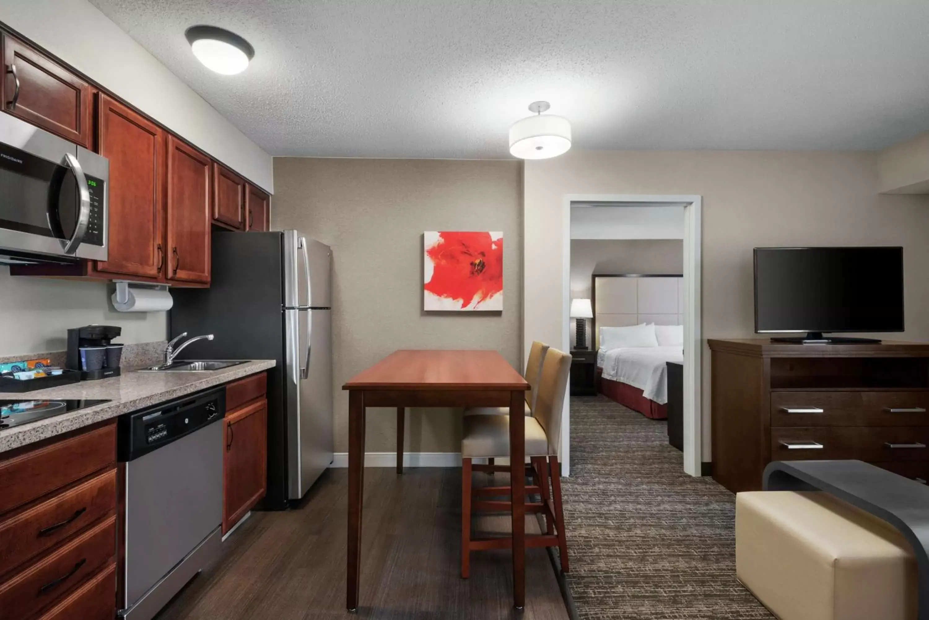 Bedroom, Kitchen/Kitchenette in Homewood Suites Rochester-Henrietta