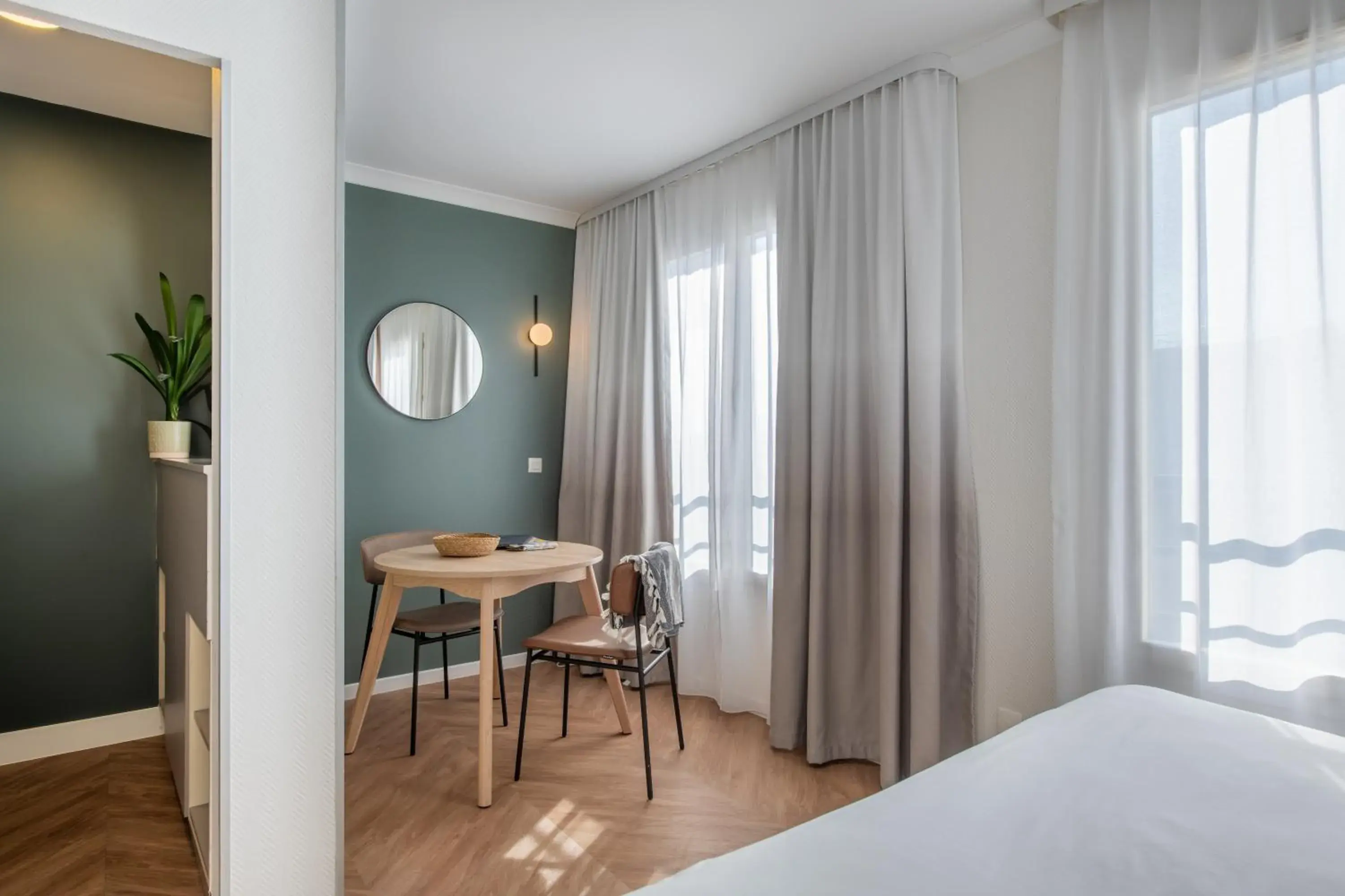 Bedroom in Adagio Paris Buttes Chaumont Aparthotel