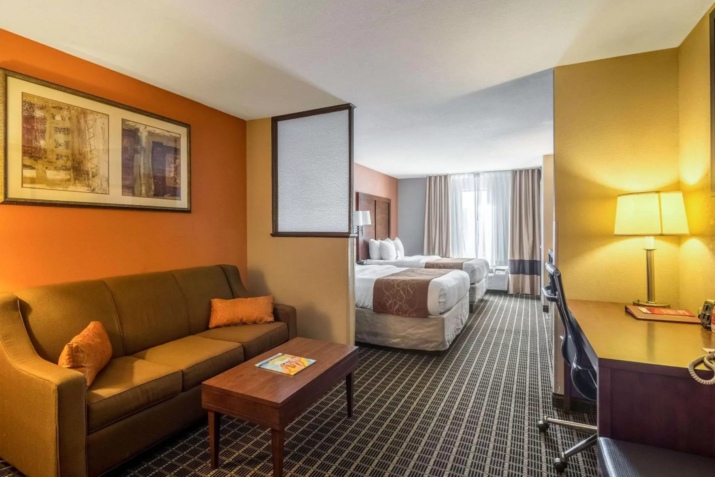 Bedroom, Seating Area in Comfort Suites