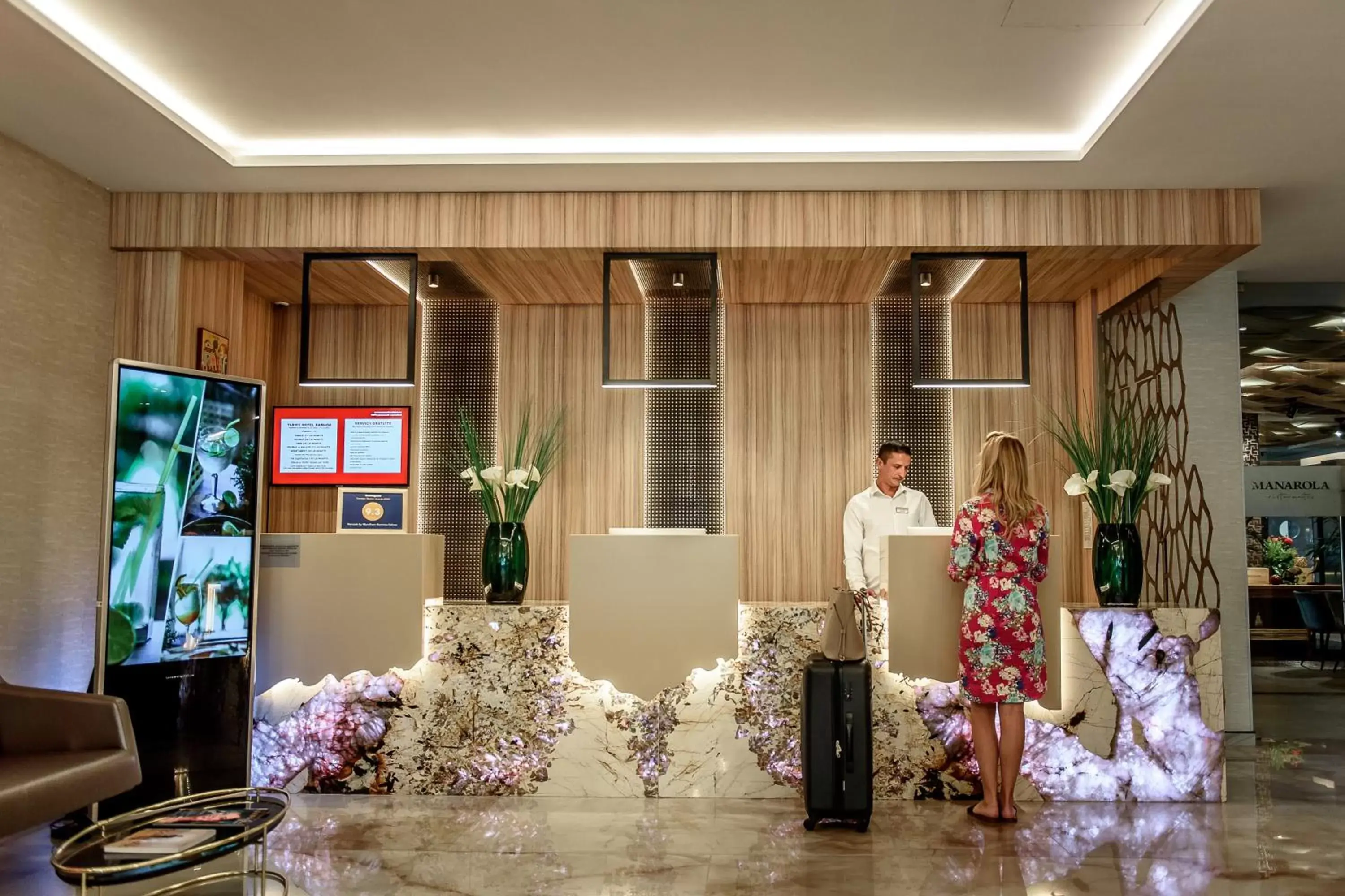 Lobby or reception in Ramada by Wyndham Ramnicu Valcea Lobby or reception in Ramada by Wyndham Ramnicu Valcea